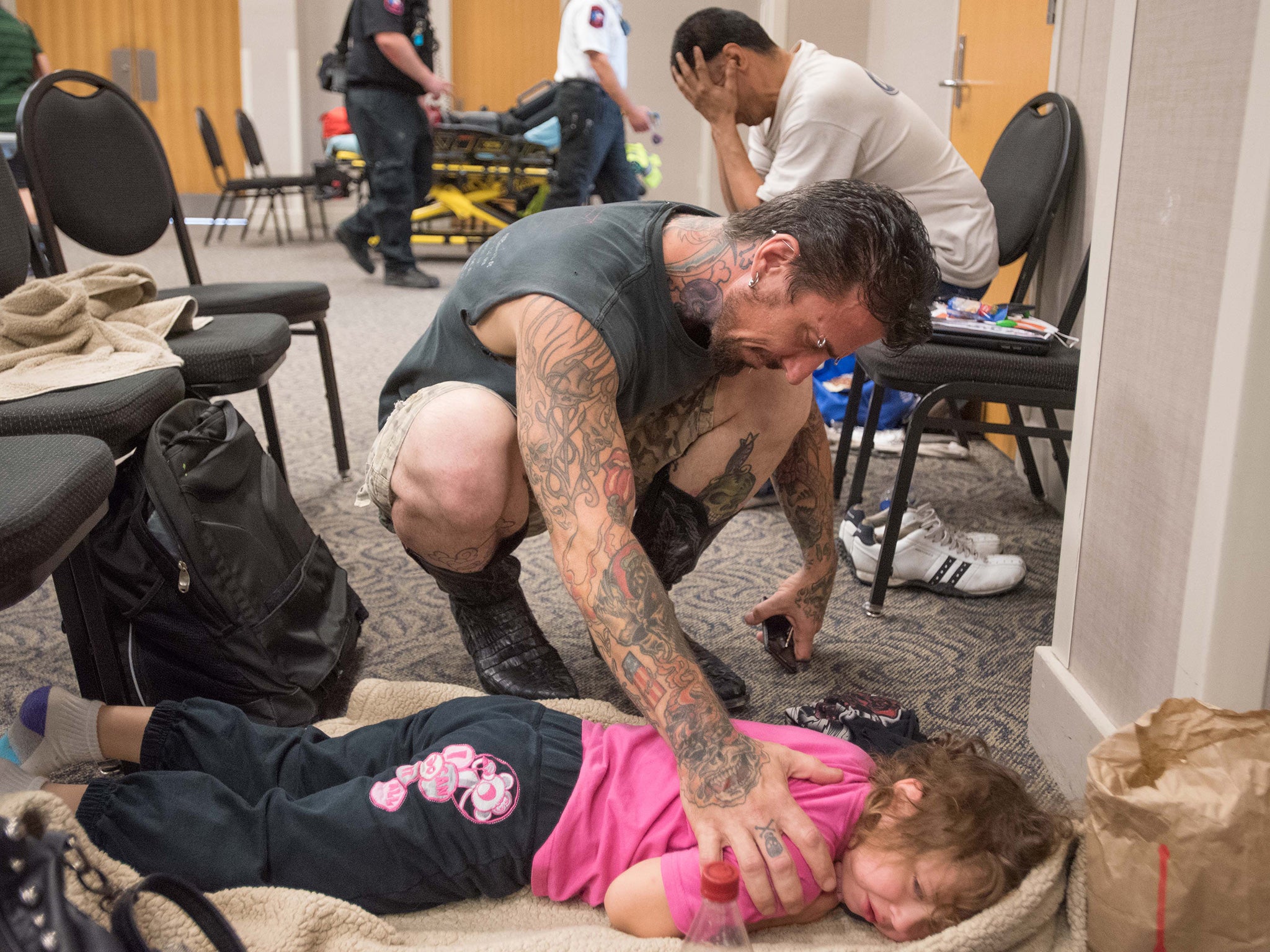 David Barry consoles his 5-year-old daughter, Marley