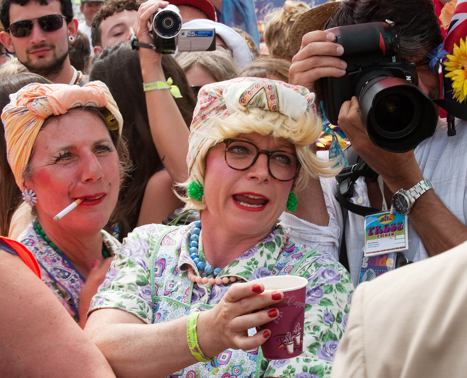 Performers drink tea at the Glastonbury festival in 2010