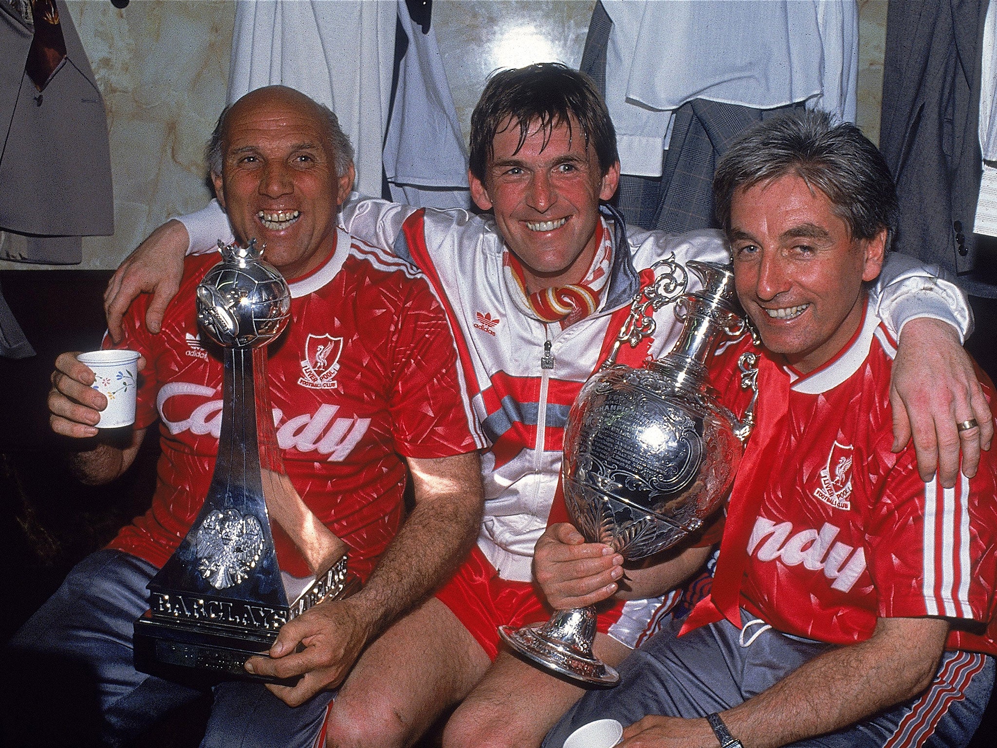 Ronnie Moran, Kenny Dalglish and Roy Evans celebrate in Liverpool’s glory years, when they last won the league trophy in 1990