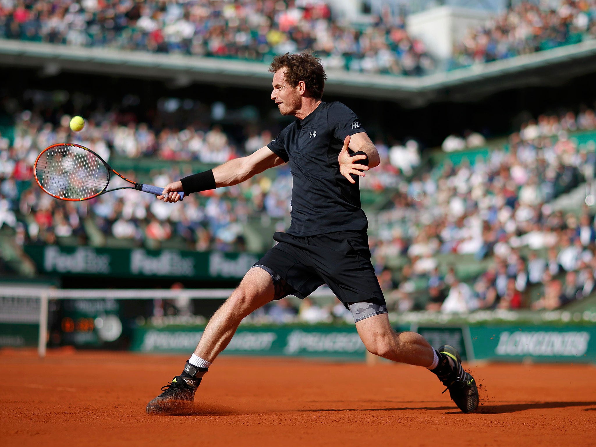 Andy Murray plays a backhand during his straight-sets victory over Facundo Arguello in Paris