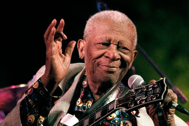 Two of blues legend BB King's daughters have accused his two closest aides of poisoning him