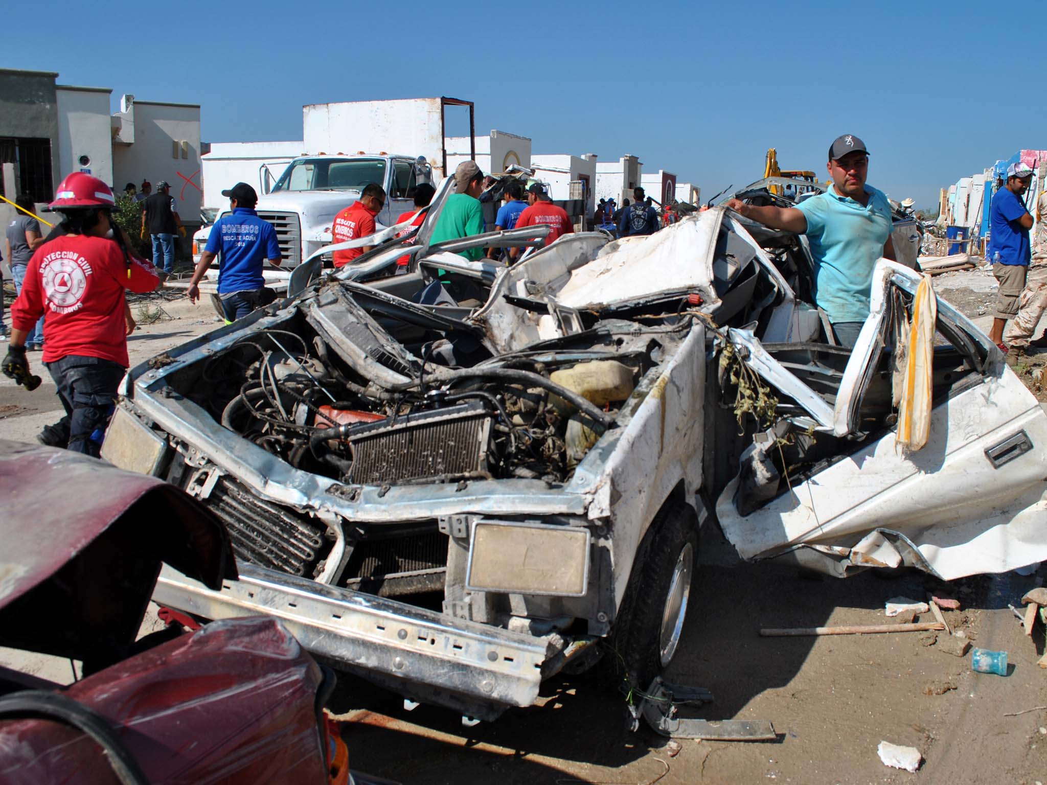 Cars were bent and crushed in the US-Mexico whirlwind