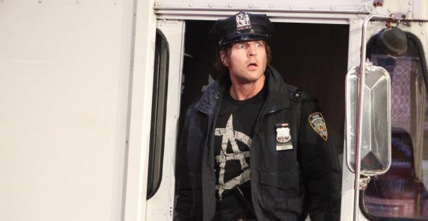 Dean Ambrose returns to the arena in a police van