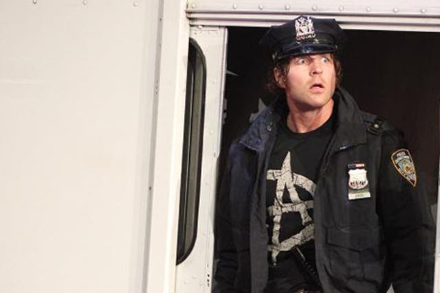 Dean Ambrose returns to the arena in a police van