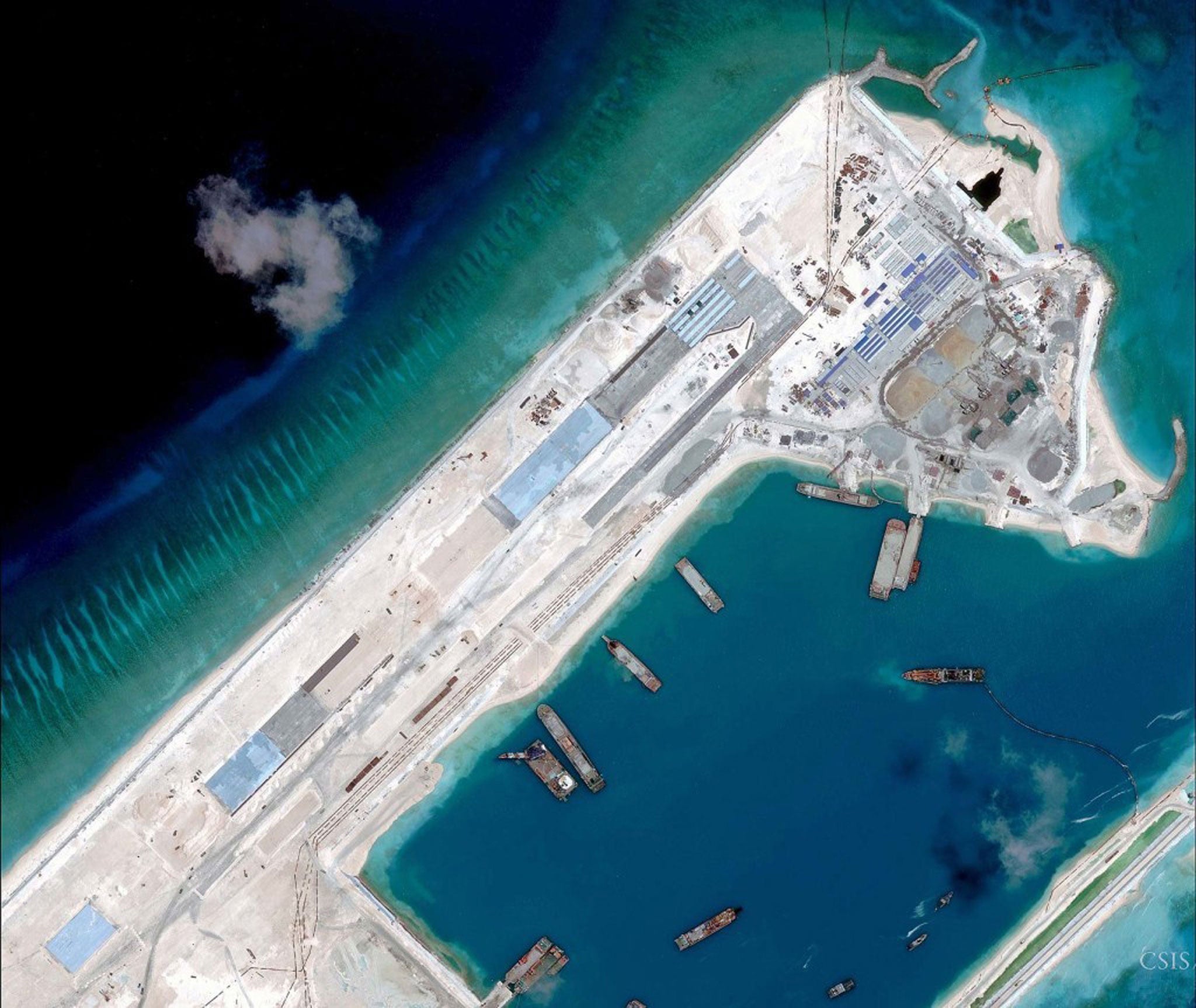 A satellite image of what is claimed to be an under-construction airstrip at Fiery Cross Reef in the Spratly Islands in the disputed South China Sea