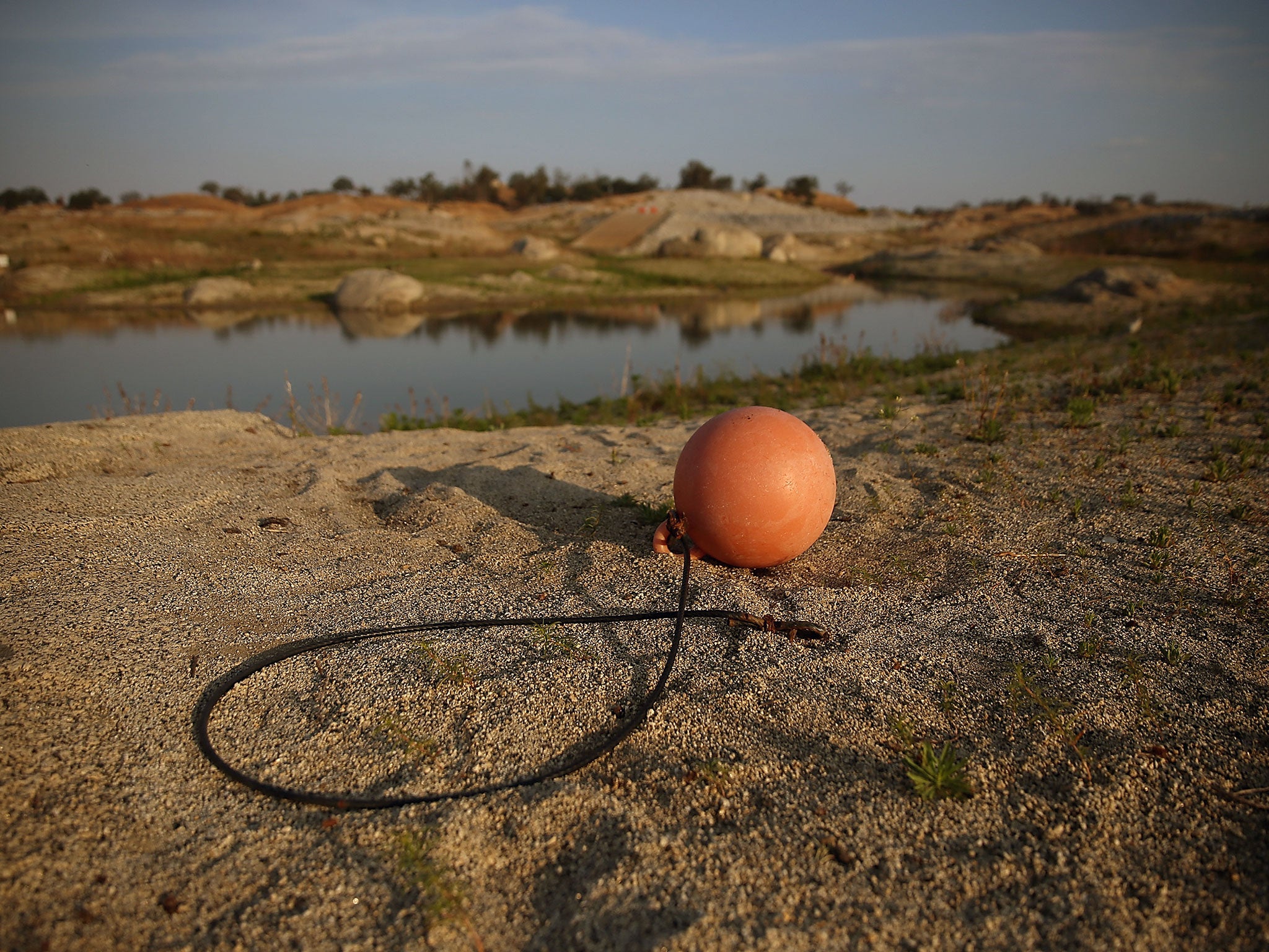 A bouy sits on what used to be the bottom of Hensley Lake in Raymond