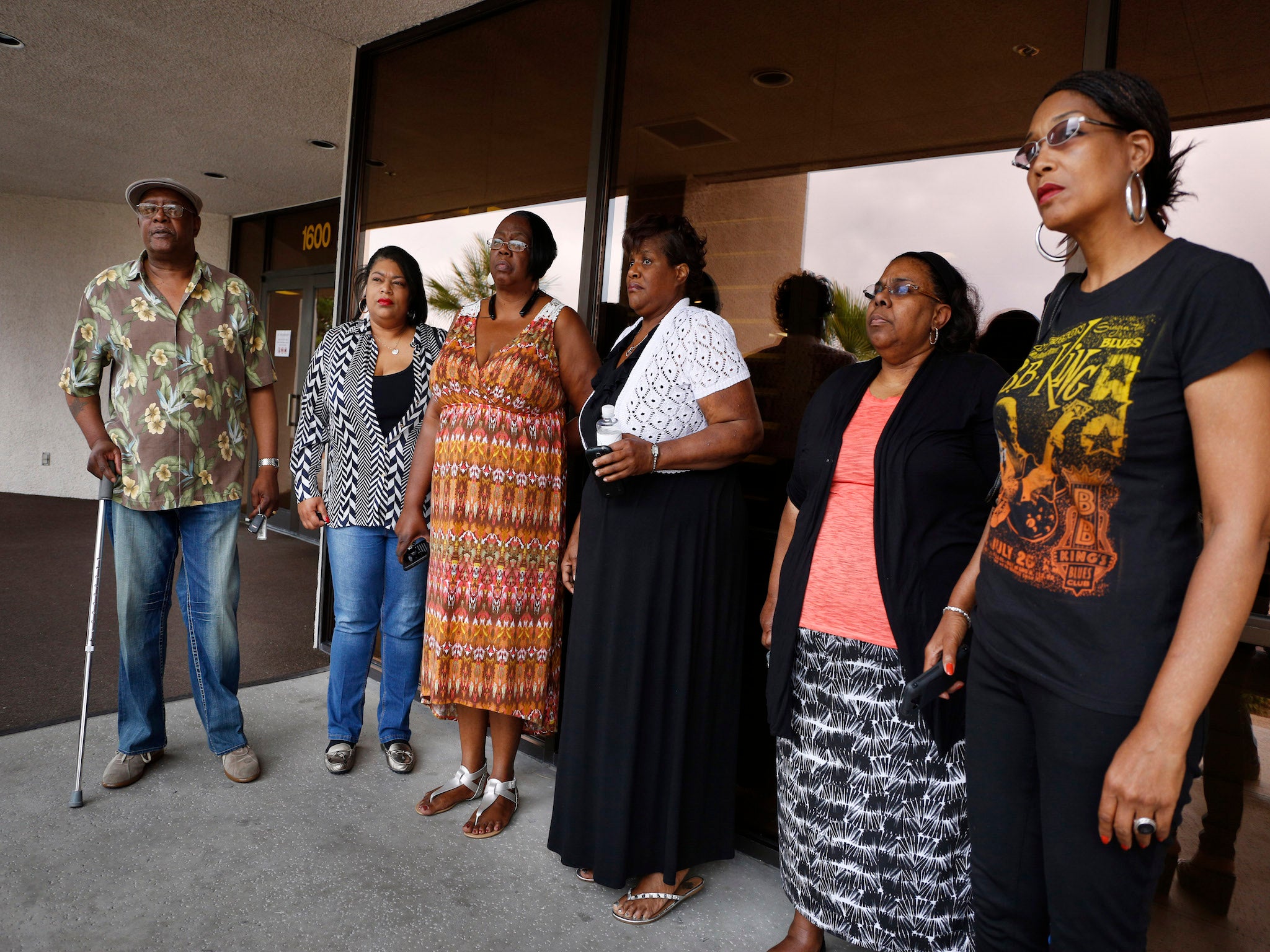 Patty King and Karen Williams (3rd &amp; 4th from left) with other members of the King family outside a Las Vegas funeral home