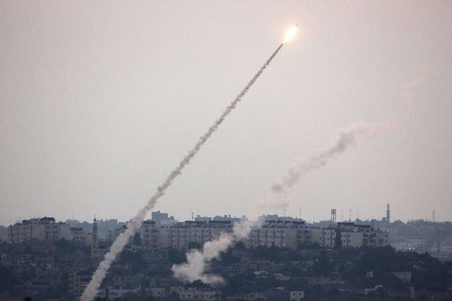 A picture taken from the southern Israeli Gaza border shows a rocket being launched from the Gaza strip into Israel, on July 11, 2014