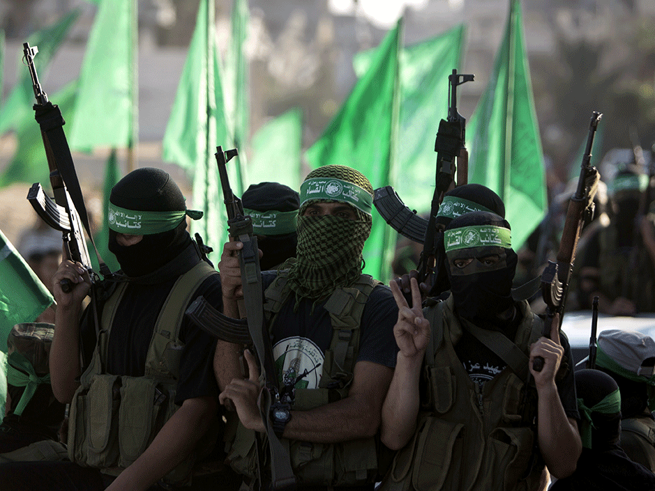 Hamas' armed wing take part in a rally in Gaza City in August 2014
