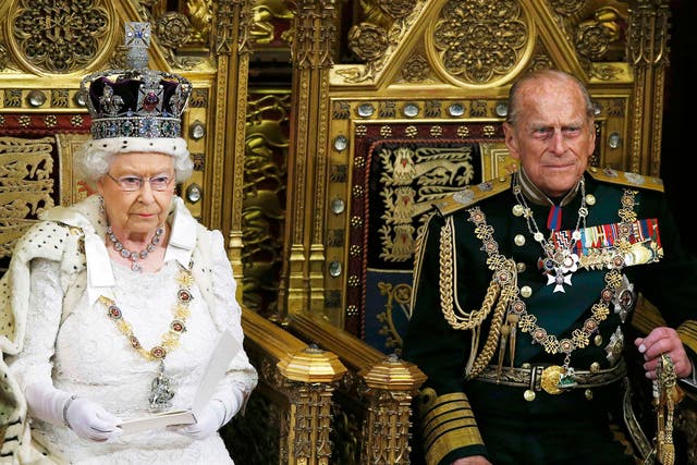 Queen Elizabeth delivers the Queen's Speech next to Prince Phillip during the State Opening of Parliament in the Palace of Westminster in London 