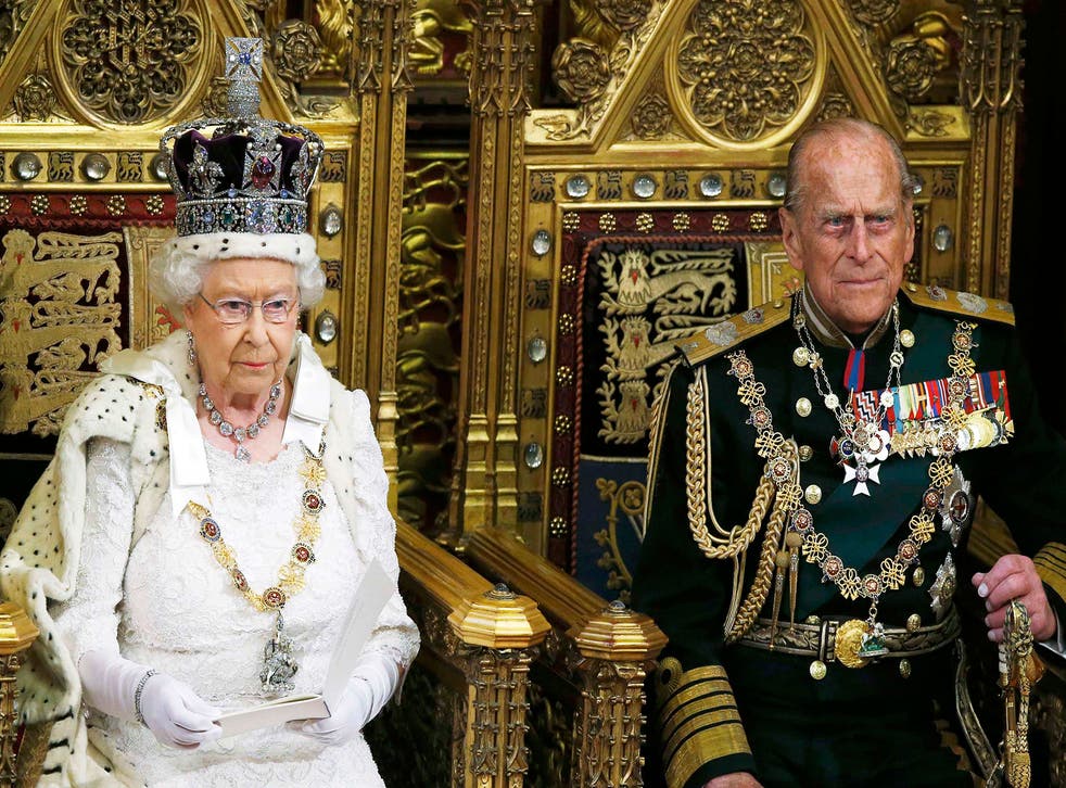 Queen Elizabeth delivers the Queen's Speech next to Prince Phillip during the State Opening of Parliament in the Palace of Westminster in London