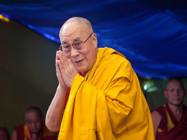The Dalai Lama's Glastonbury appearance has stirred controversy