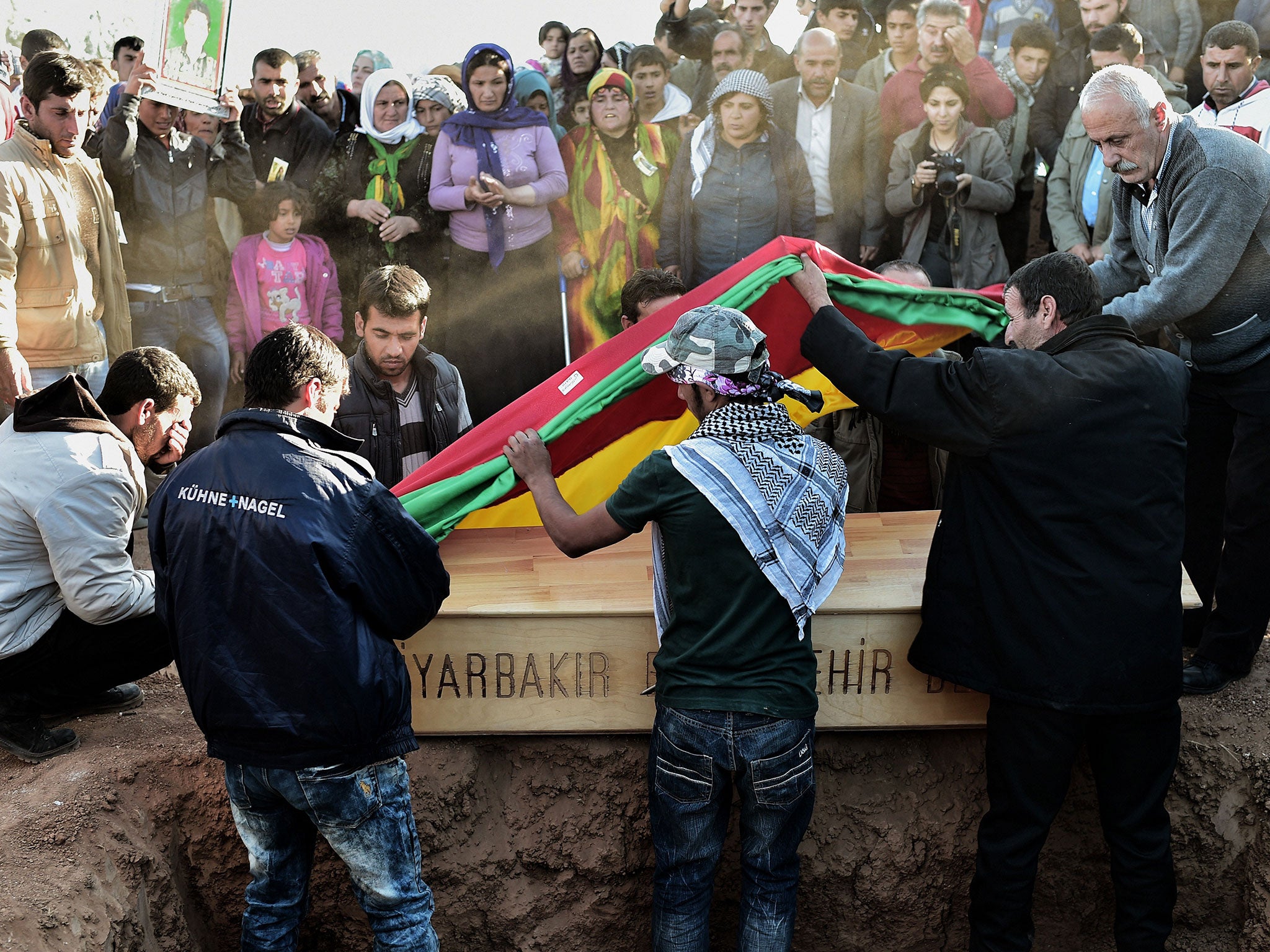 Kurds honour a fighter who died during the successful defence of Kobani against Isis