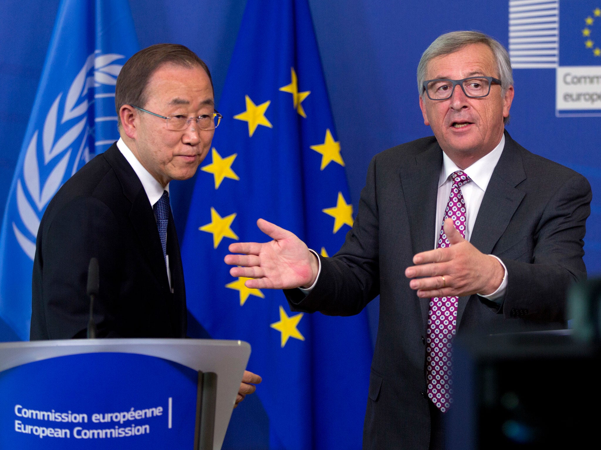 United Nations Secretary-General Ban Ki-moon, left, and European Commission President Jean-Claude Juncker participate in a media conference at EU headquarters in Brussels. Ban Ki-moon called for international solidarity to deal with the issue of tens of t