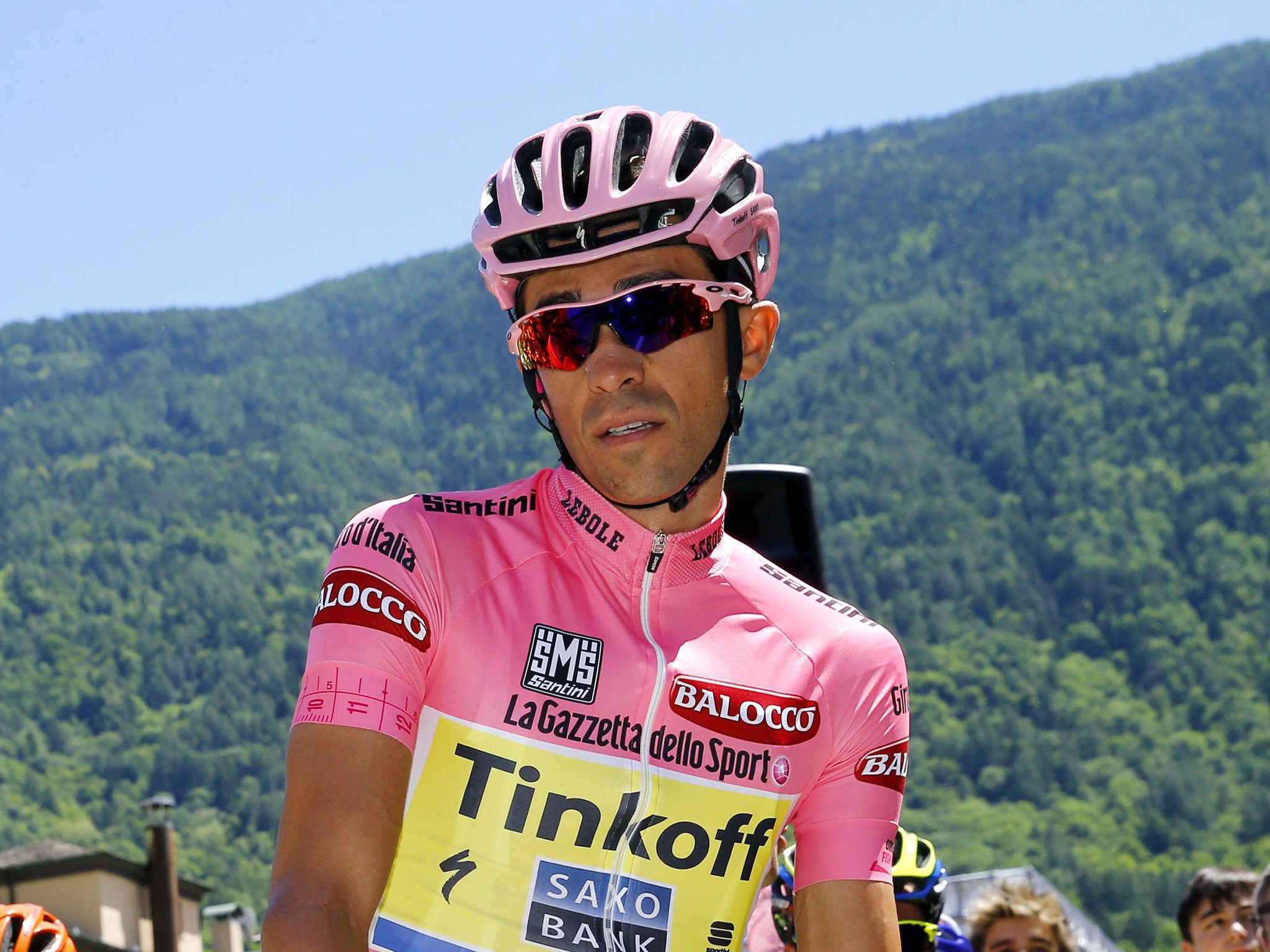 Alberto Contador maintained his overall lead in the Giro on a day of penalties