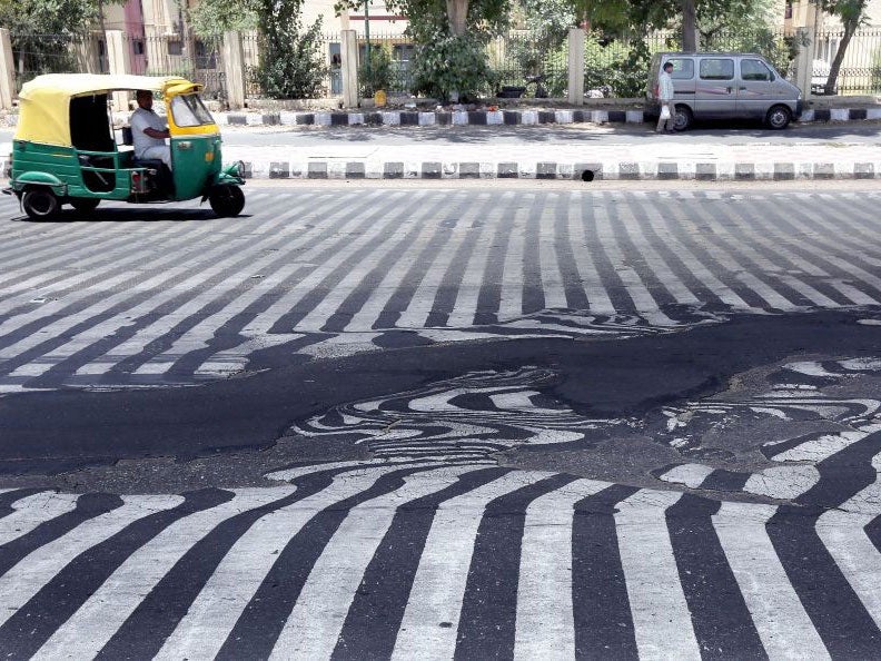 The extreme heat is melting the roads in Delhi