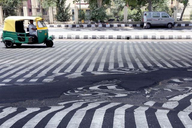 The extreme heat is melting the roads in Delhi