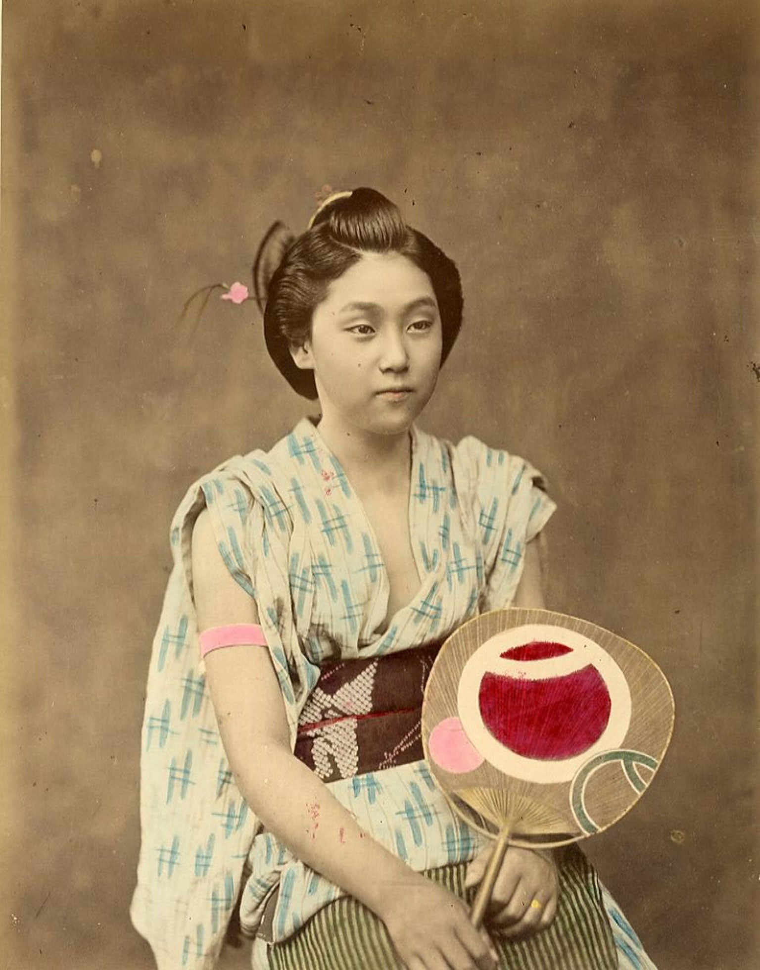 Portrait of a woman with a fan by Felice Beato, 1865 © : Galerie Verdeau, Paris/The London Photograph Fair