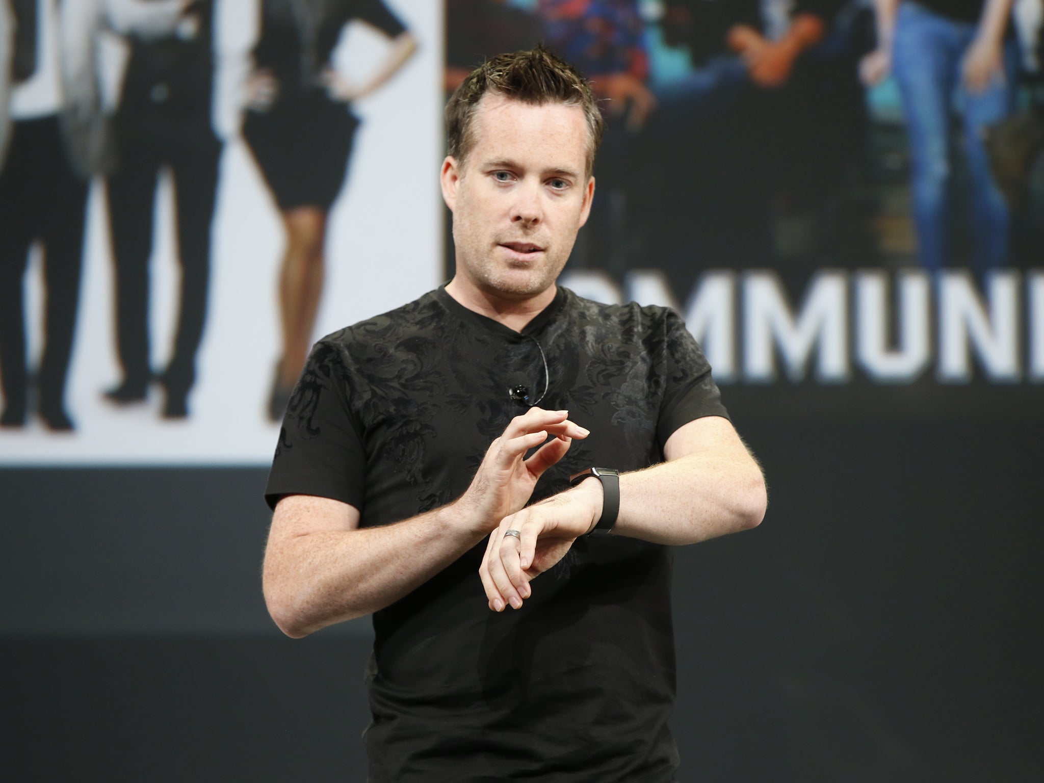 Dave Burke, Director of Engineering, Android at Google, uses an Android Wear watch during Google I/O Developers Conference at Moscone Center on June 25, 2014 in San Francisco, California