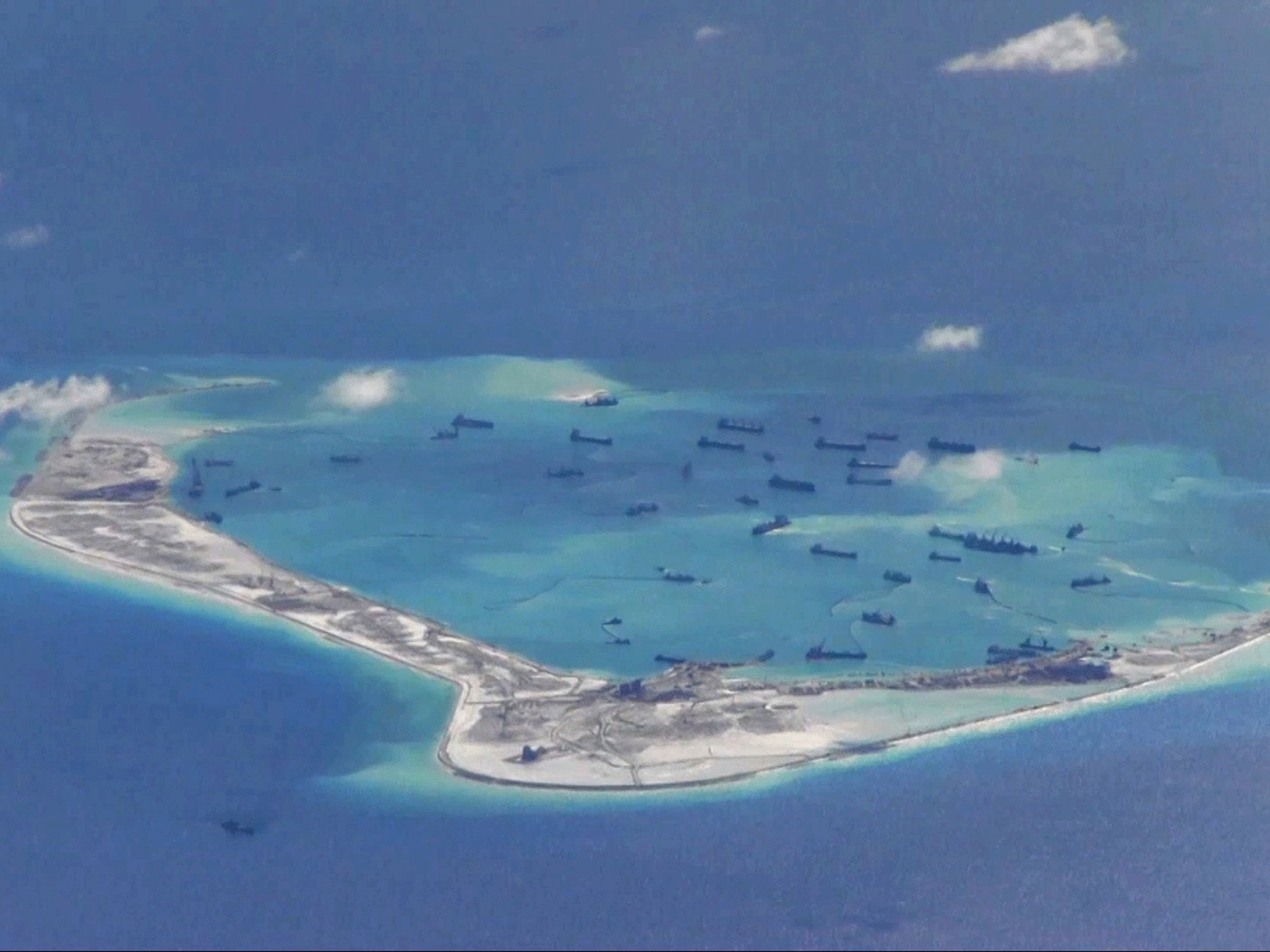 Land around the Spratly Islands in the South China Sea has been reclaimed using dredging