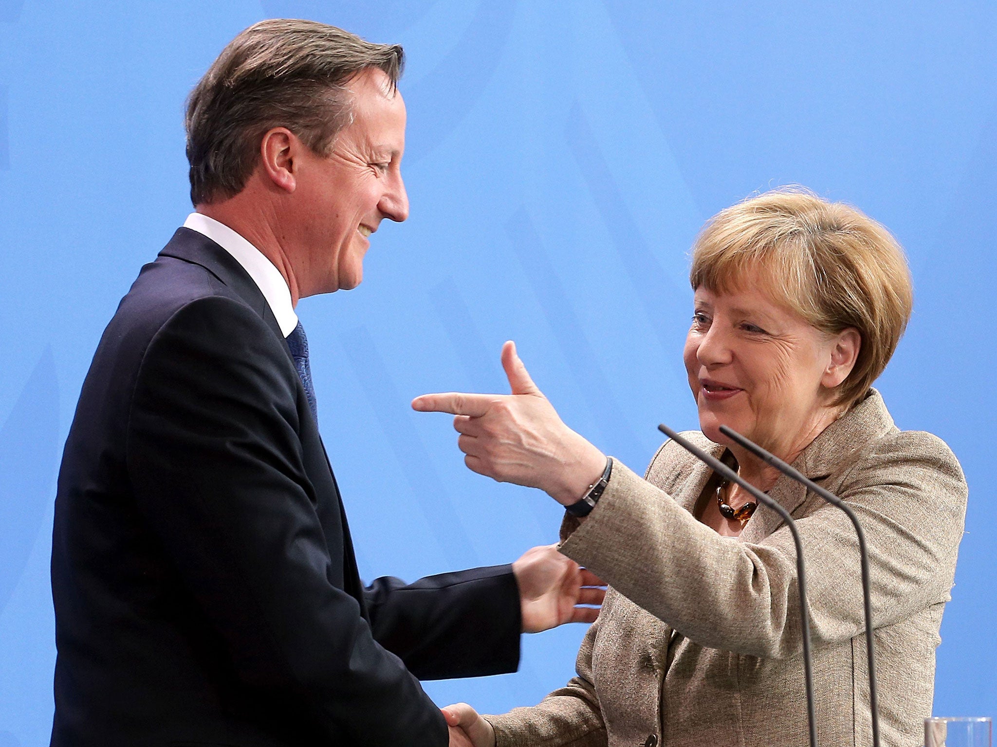 Angela Merkel and David Cameron say goodbye in the Bundeskanzleramt after their meeting in Berlin, Germany, 29 May 2015