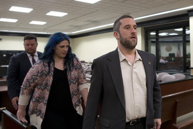 Dustin Diamond, with his fiancee Amanda Schutz and her attorney walk out of the coutroom after a split verdict in an Ozaukee County Courthouse May 29, 2015