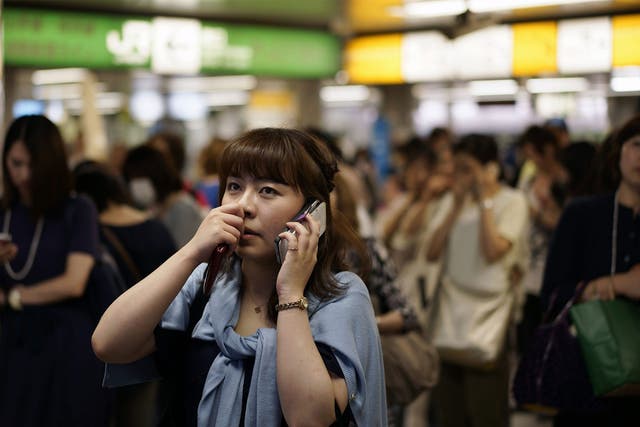 Commuters were trapped in Ikebukuro station after train services were suspended in and around Tokyo