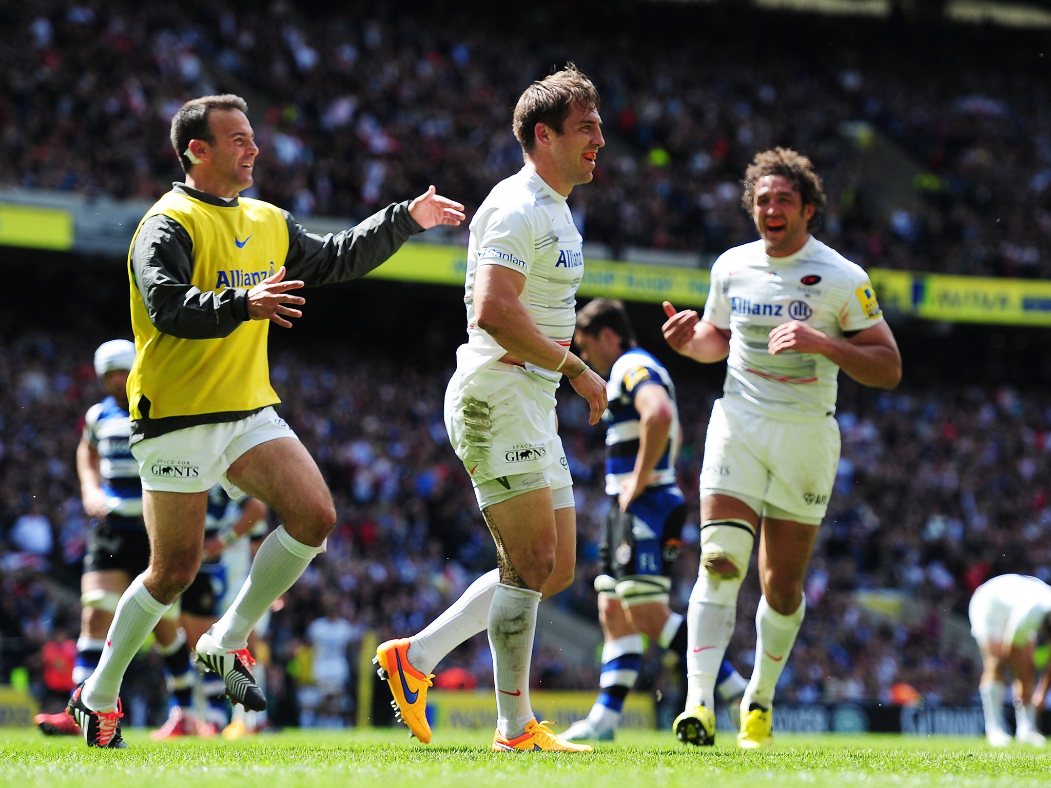 Chris Wyles celebrates scoring a third for Saracens