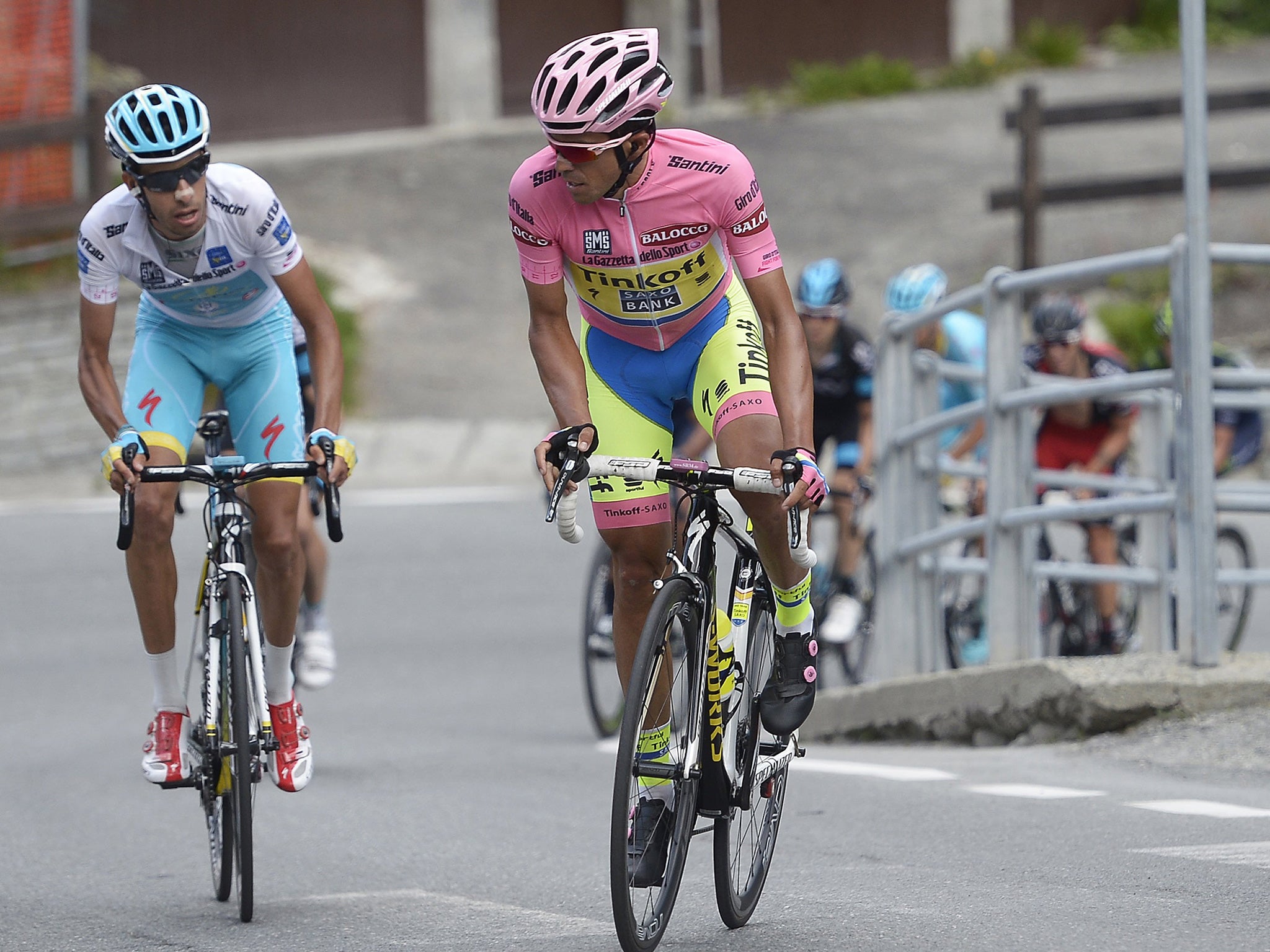 Alberto Contador (right) climbs ahead of rival Fabio Aru