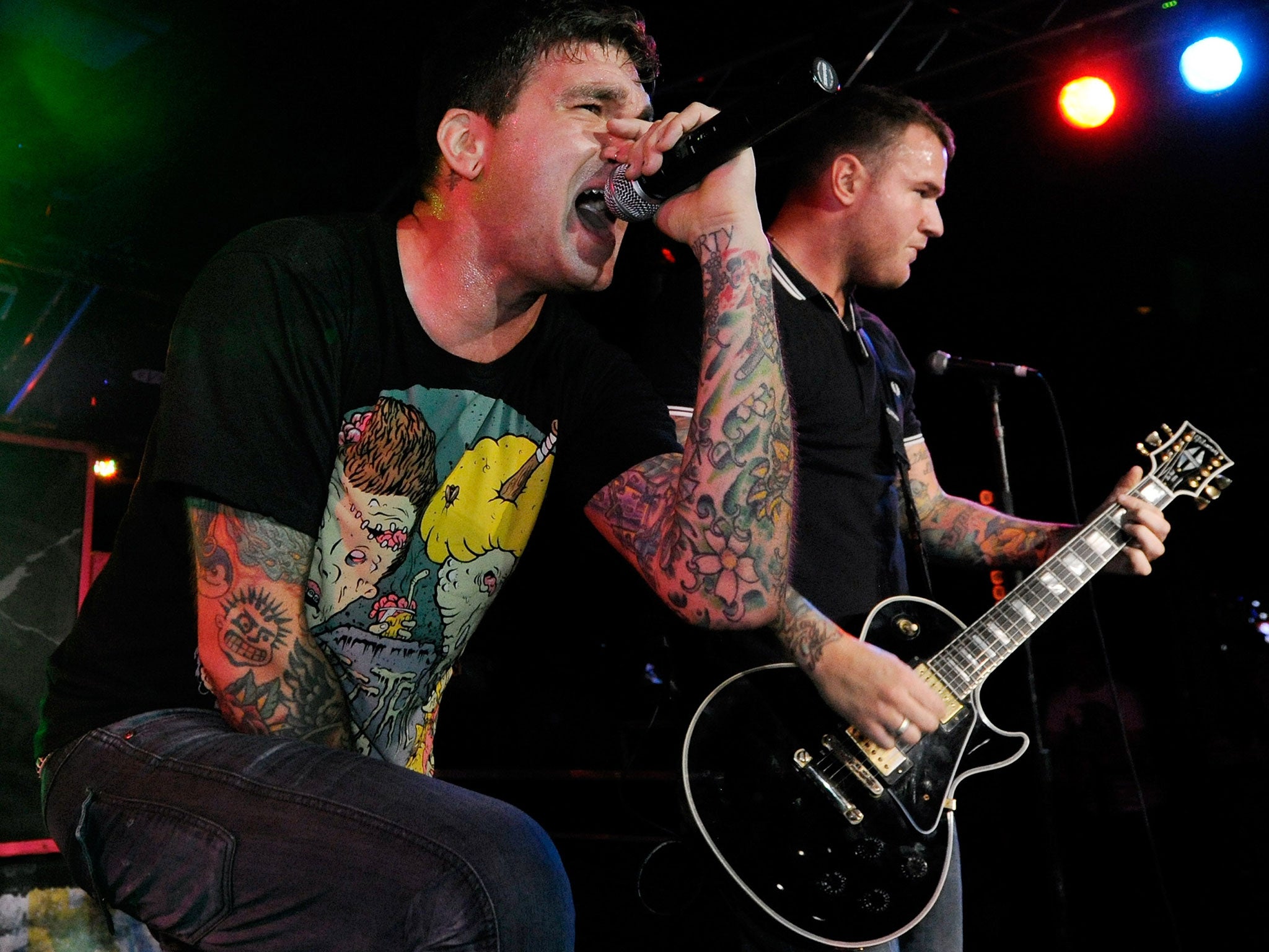 New Found Glory singer Jordan Pundik (L) and guitarist Chad Gilbert. The band saved a horse due to be sent to the slaughter