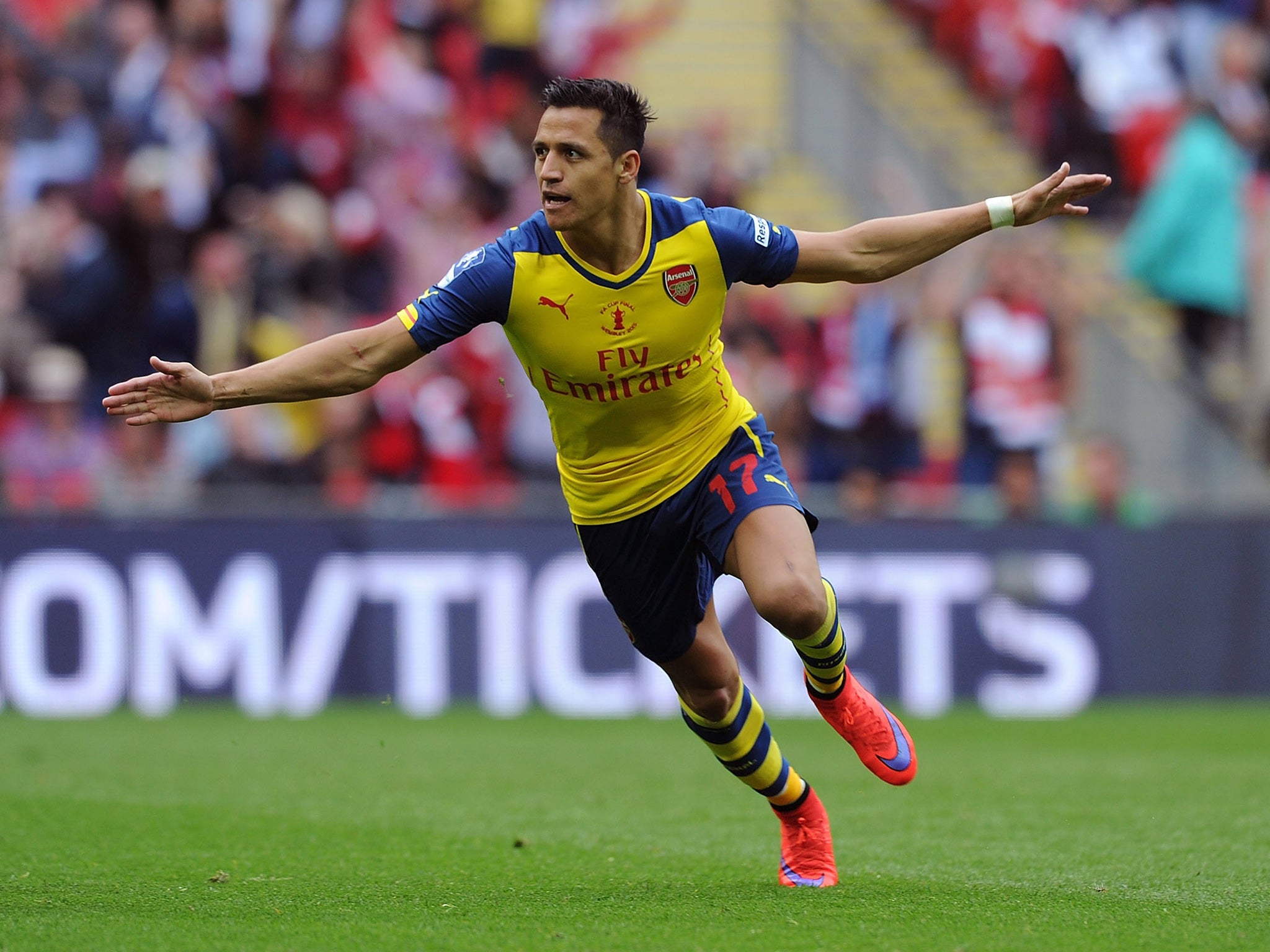 Alexis Sanchez celebrates scoring Arsenal's second in their 4-0 FA Cup final victory