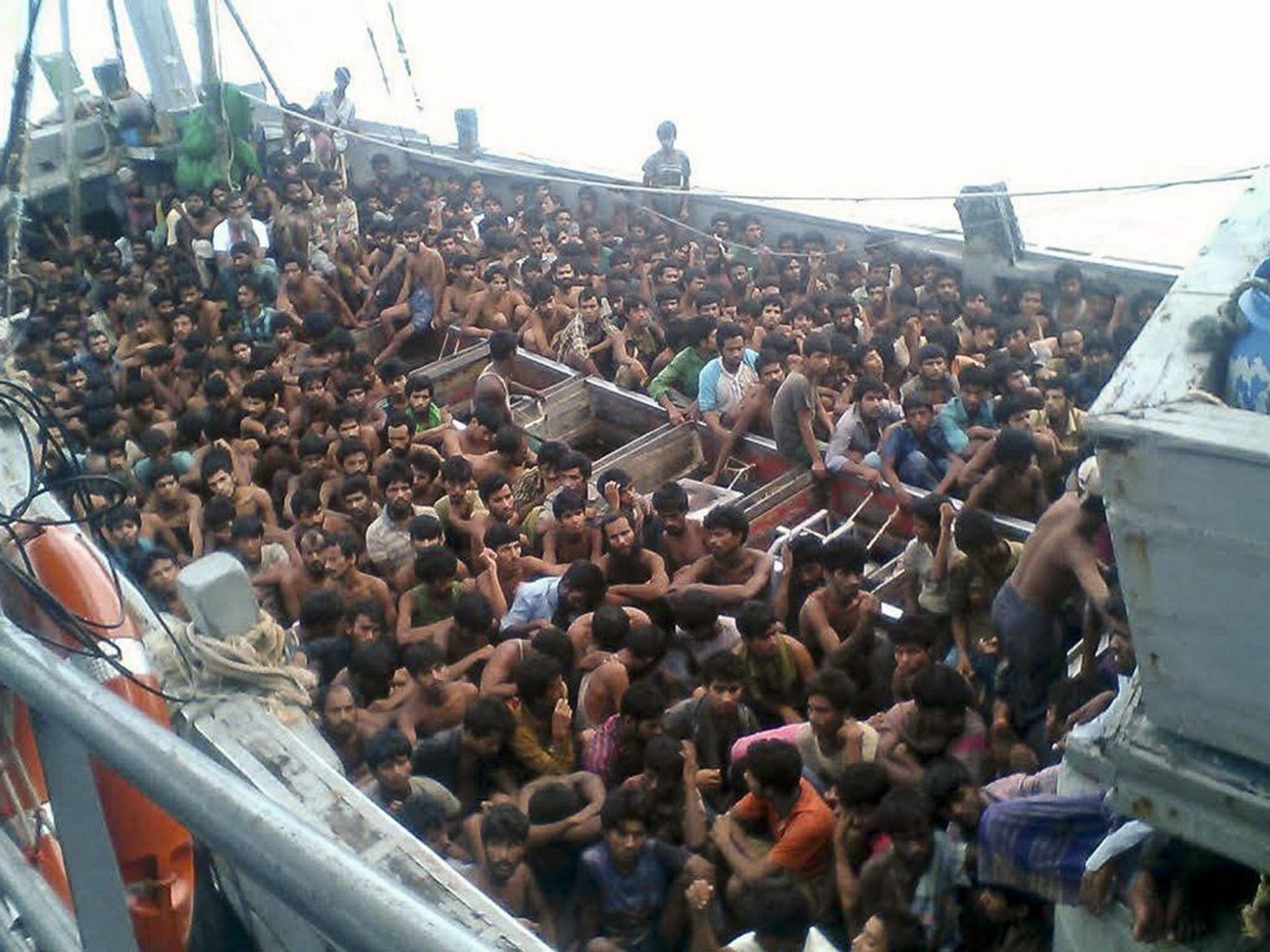 Migrants who were seized by the Myanmar navy in a boat near Irrawaddy delta of the Myanmar's southern coast.