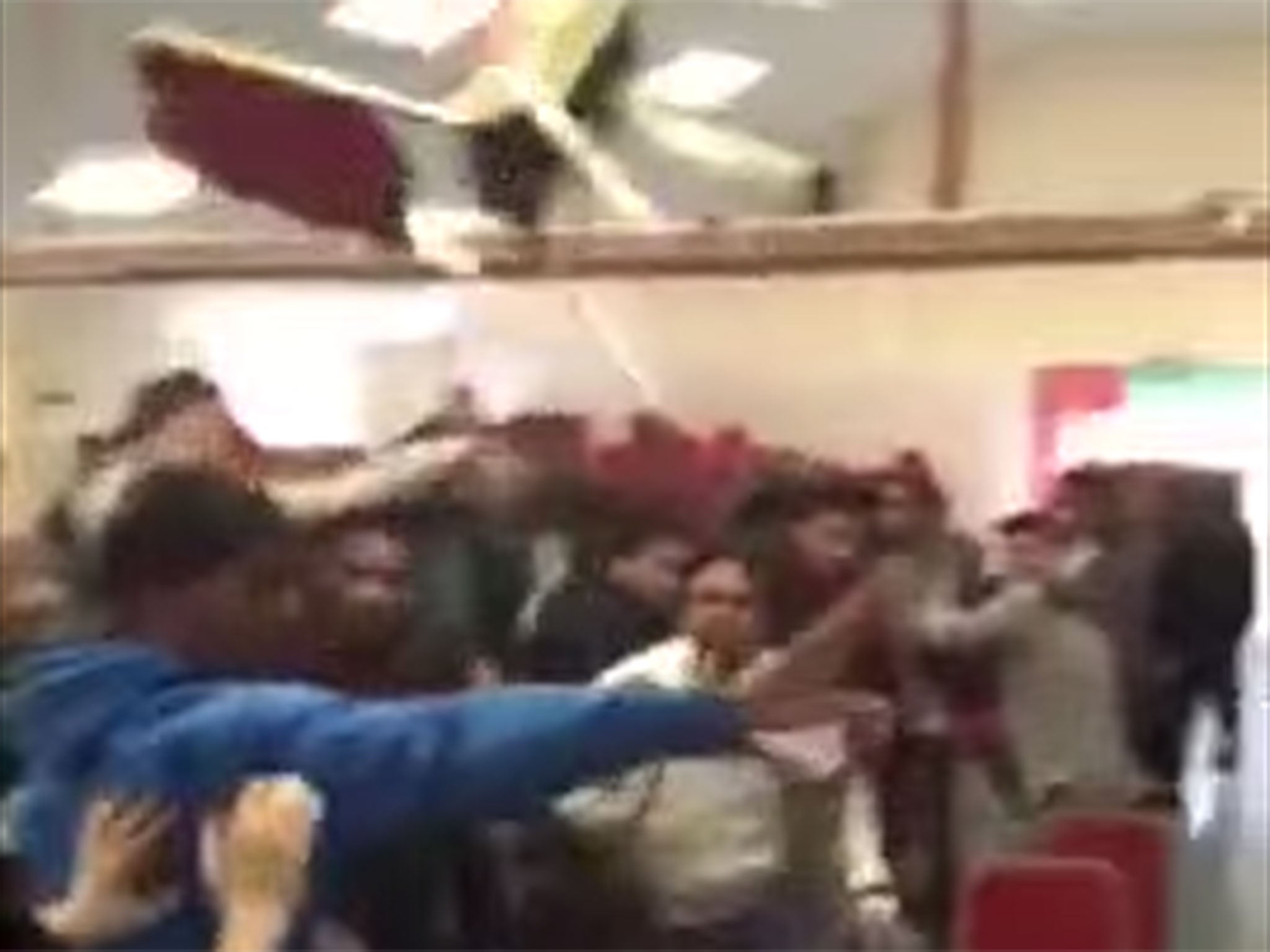 Dozens of chairs were thrown across the room in the footage