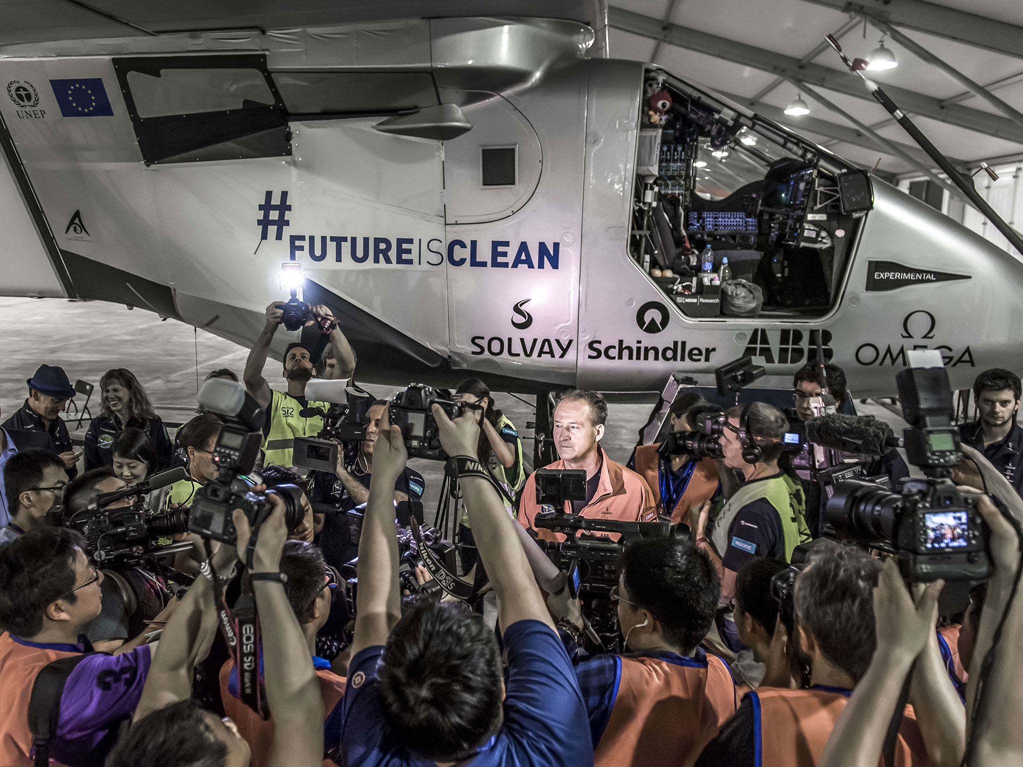 Swiss pilot Andre Borschberg speaks before ‘Solar Impulse 2’ takes off from Nanjing, China