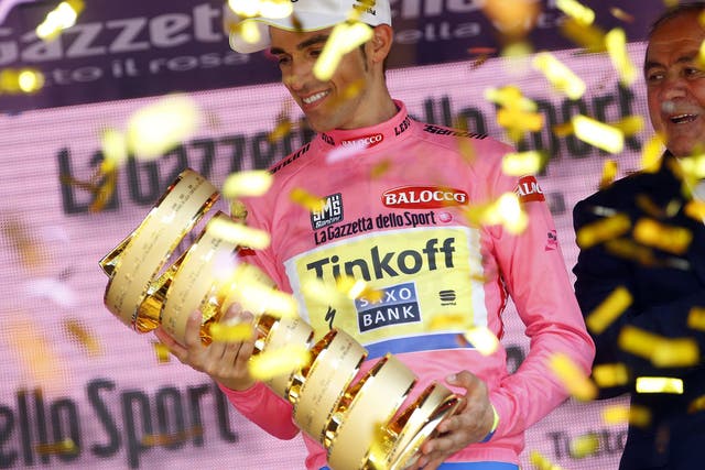 Alberto Contador celebrates after winning the Giro d'Italia