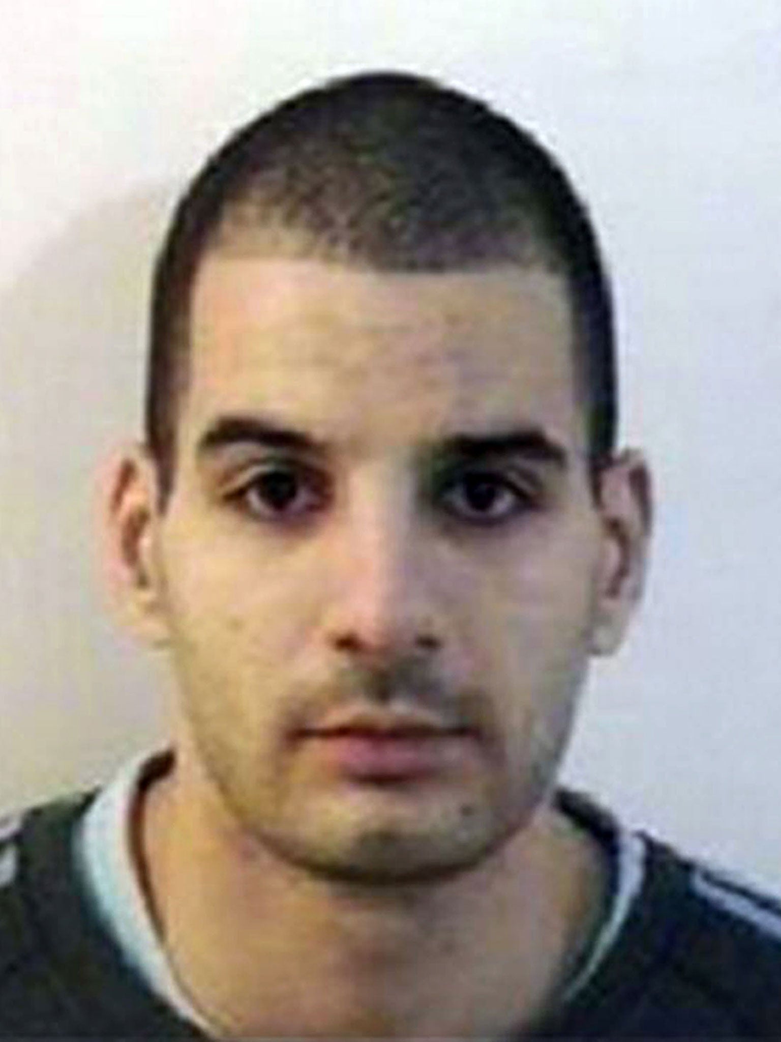 Haroon Ahmed, convicted in 2008 of robbing a garage armed with a knife, walked out the main entrance of Dovegate prison in Staffordshire