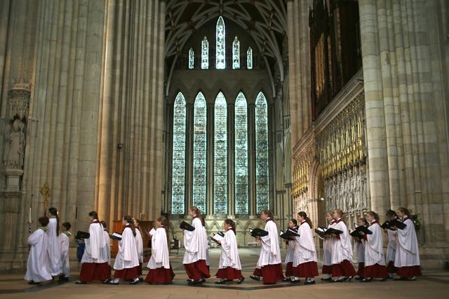 File image: The choir process through York Minster during a Eucharist Service