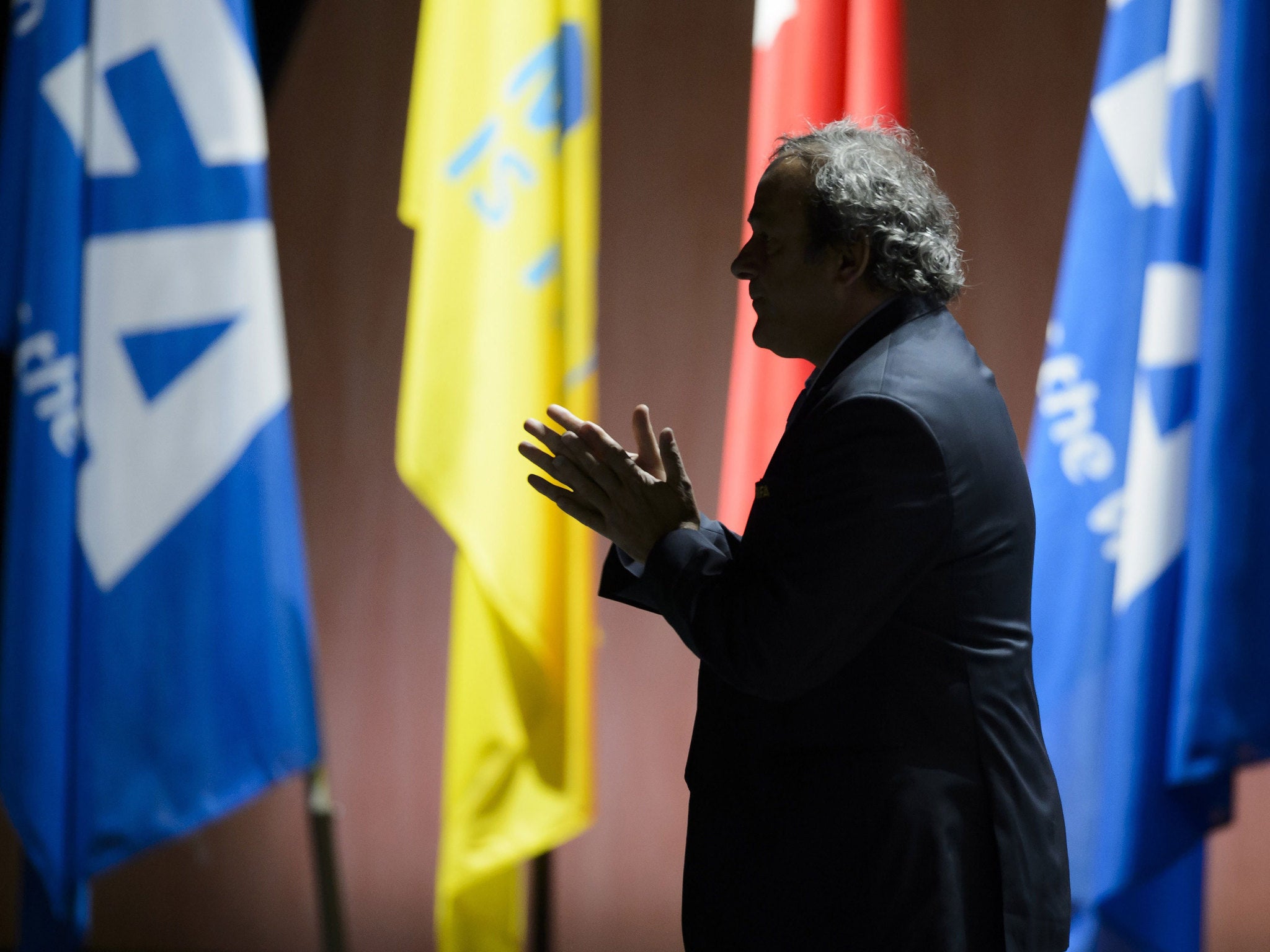 Michel Platini, the Uefa president, pictured in silhouette at the 65th FIFA Congress in Zurich