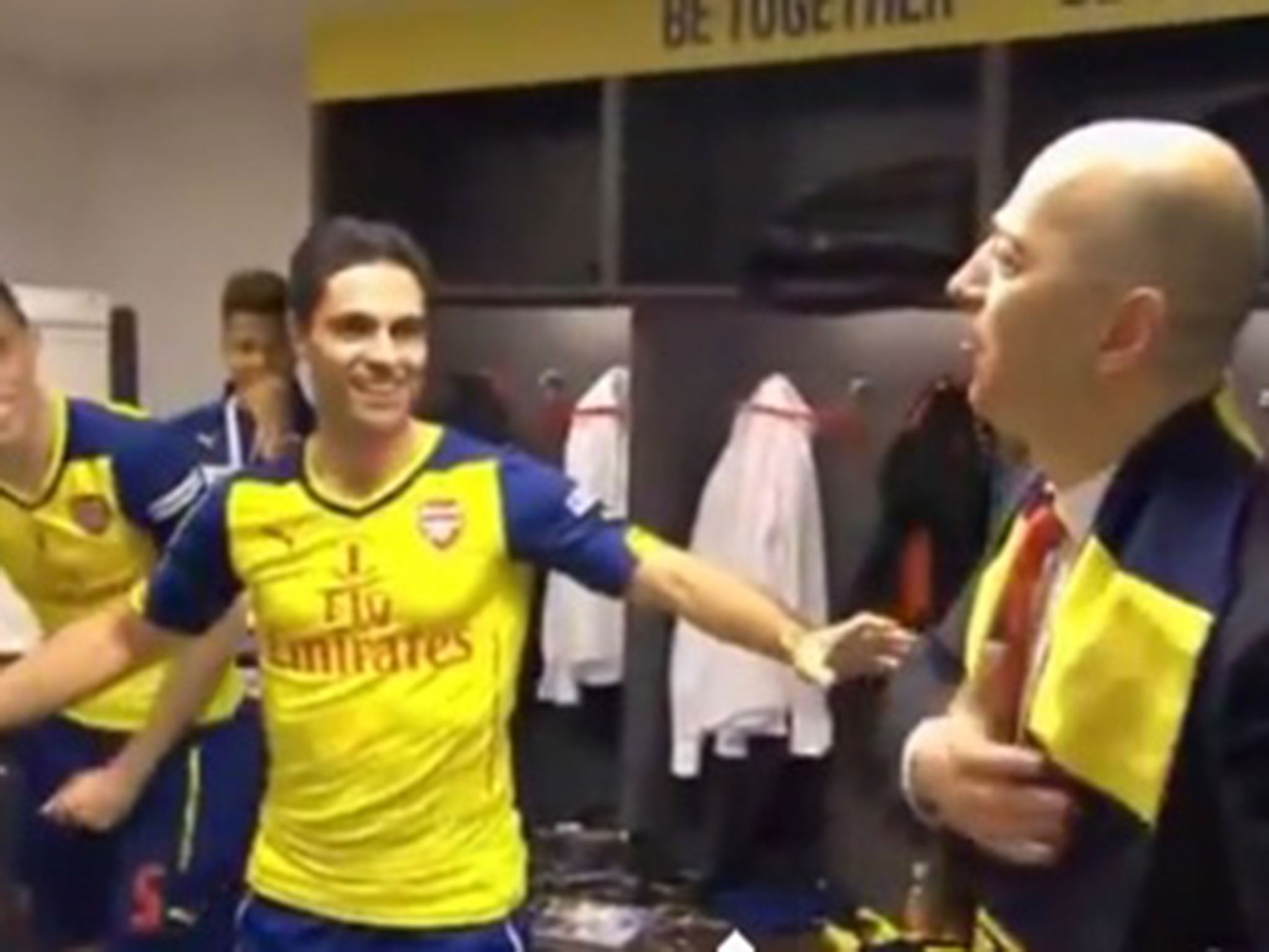 Mikel Arteta and Ivan Gazidis (right) in the Arsenal dressing room after the final