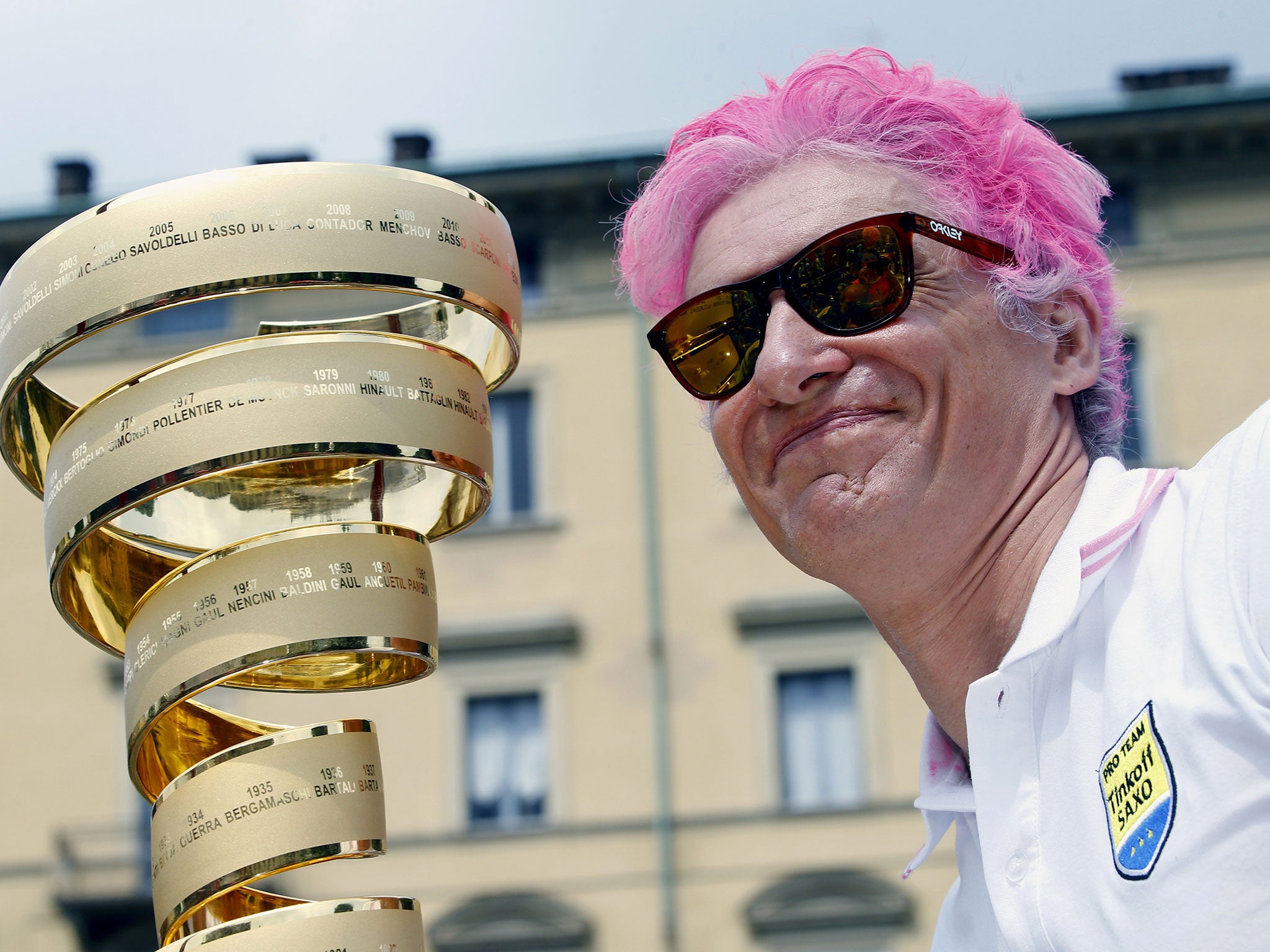 Contador's team owner Oleg Tinkoff dyed his hair pink to celebrate win – then spoke of going for the treble