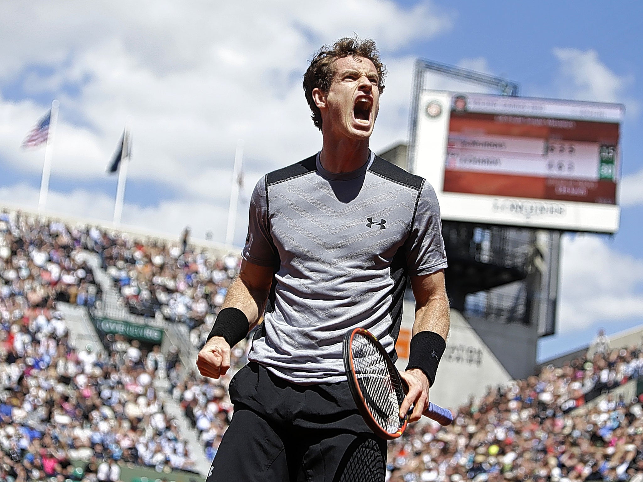 Andy Murray celebrates after beating Jeremy Chardy in the French Open to reach the quarter-finals at Roland Garros