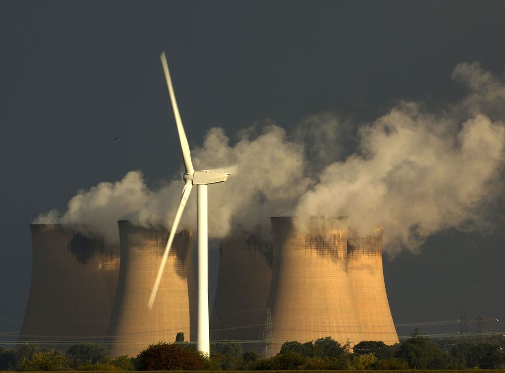 Wind turbines in the shadow of Drax, Europe’s biggest coal-fired power station, in North Yorkshire