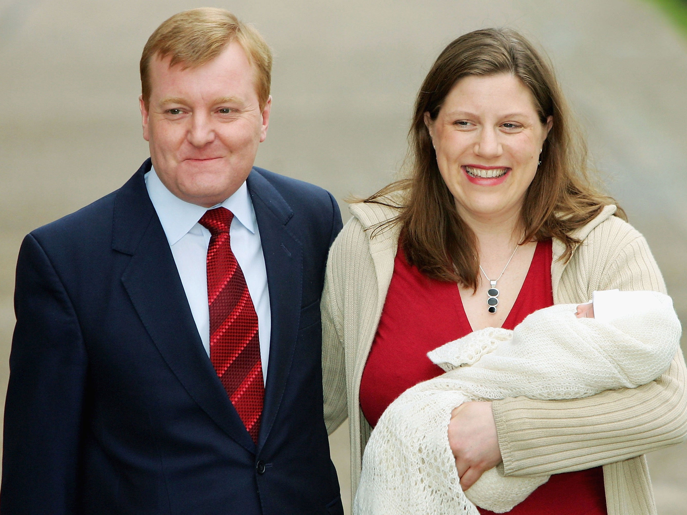 Charles Kennedy poses with his then wife Sarah and new born son Donald James on 12 April 2005
