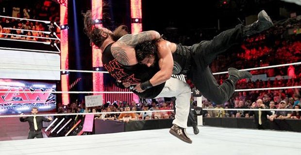 Reigns hits Wyatt with the spear