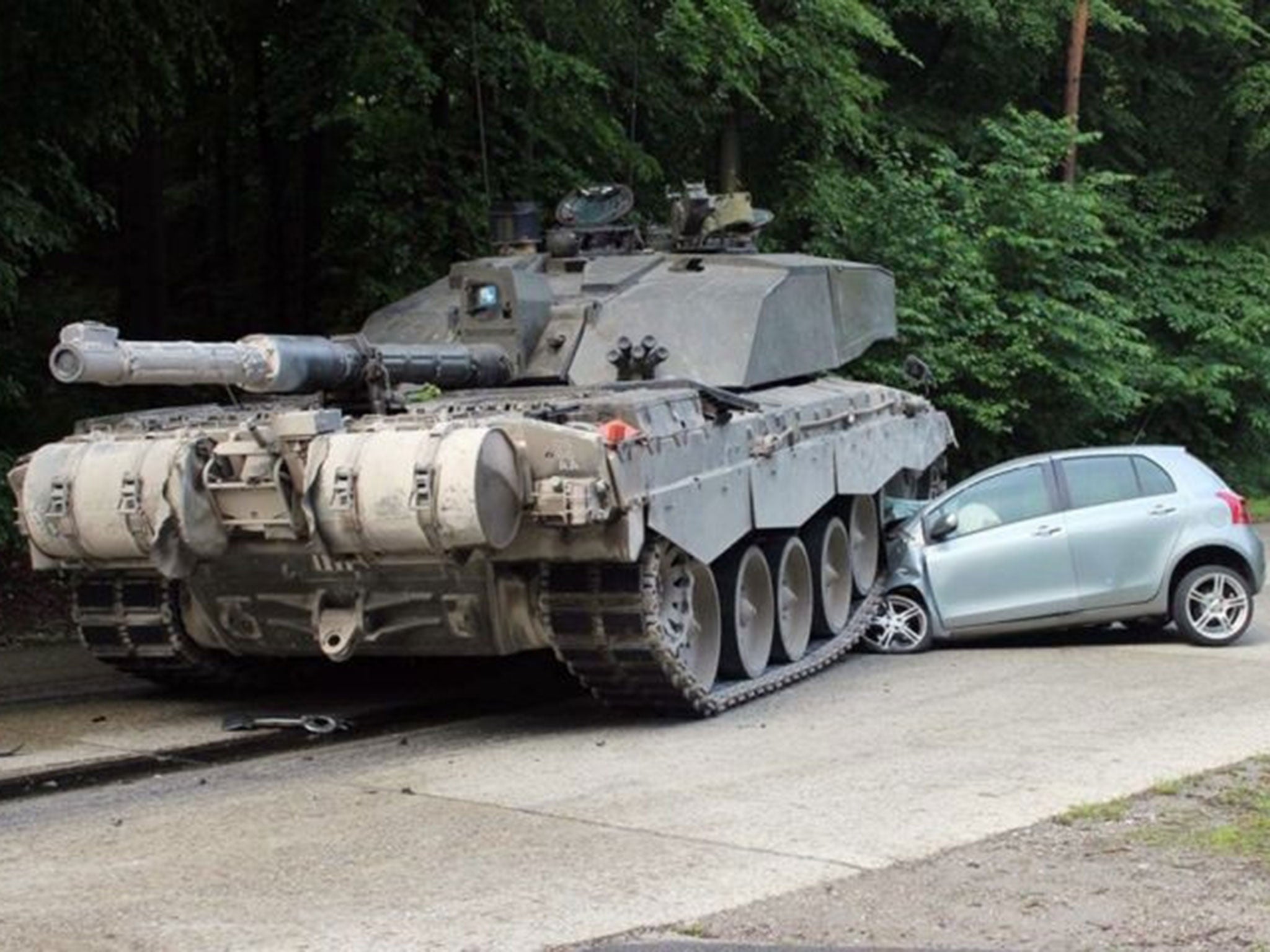 A British 'Challenger 2' tank after it rolled over a car's front in Lippe, Germany