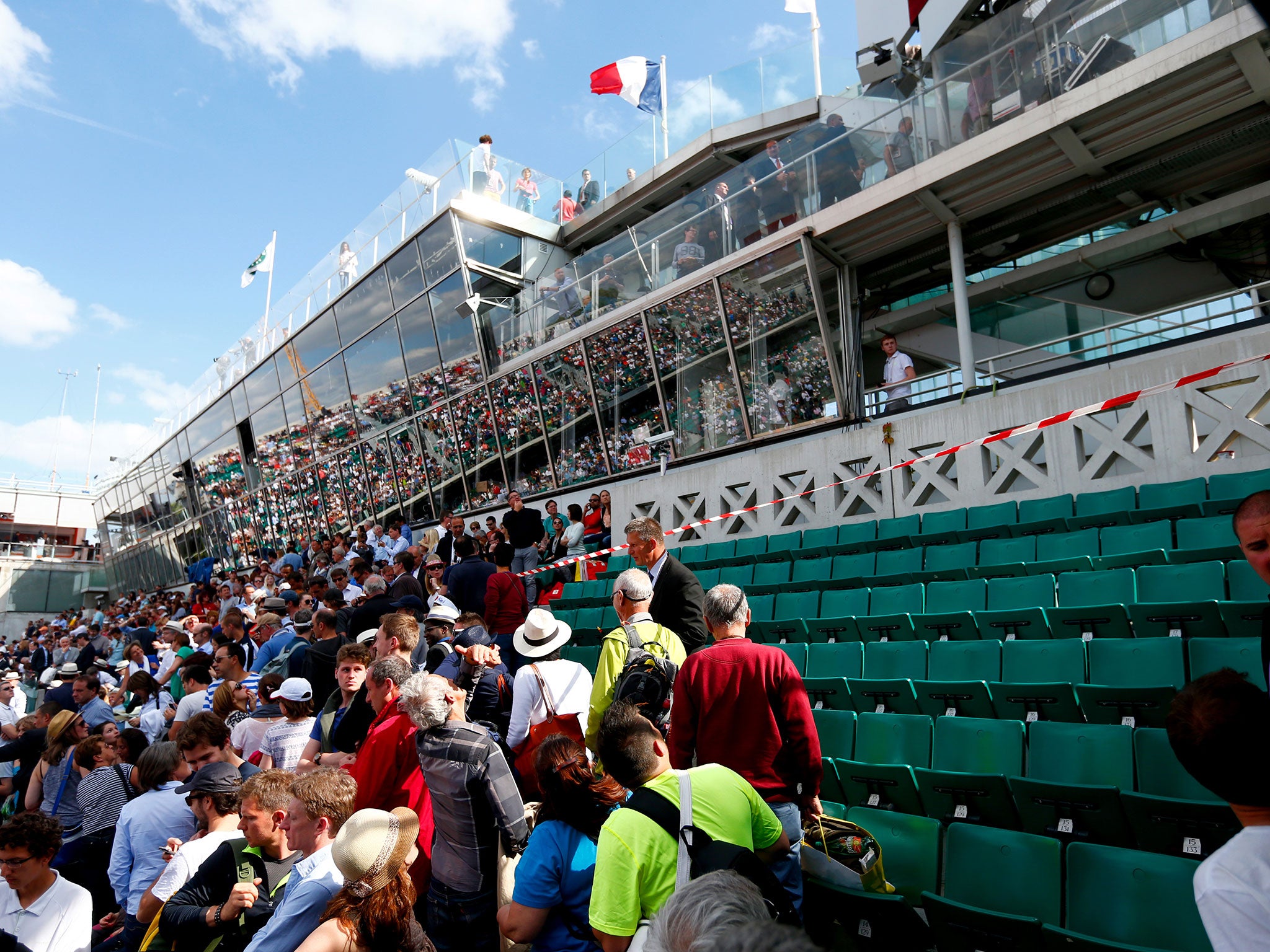 An ambulance transports an injured spectator