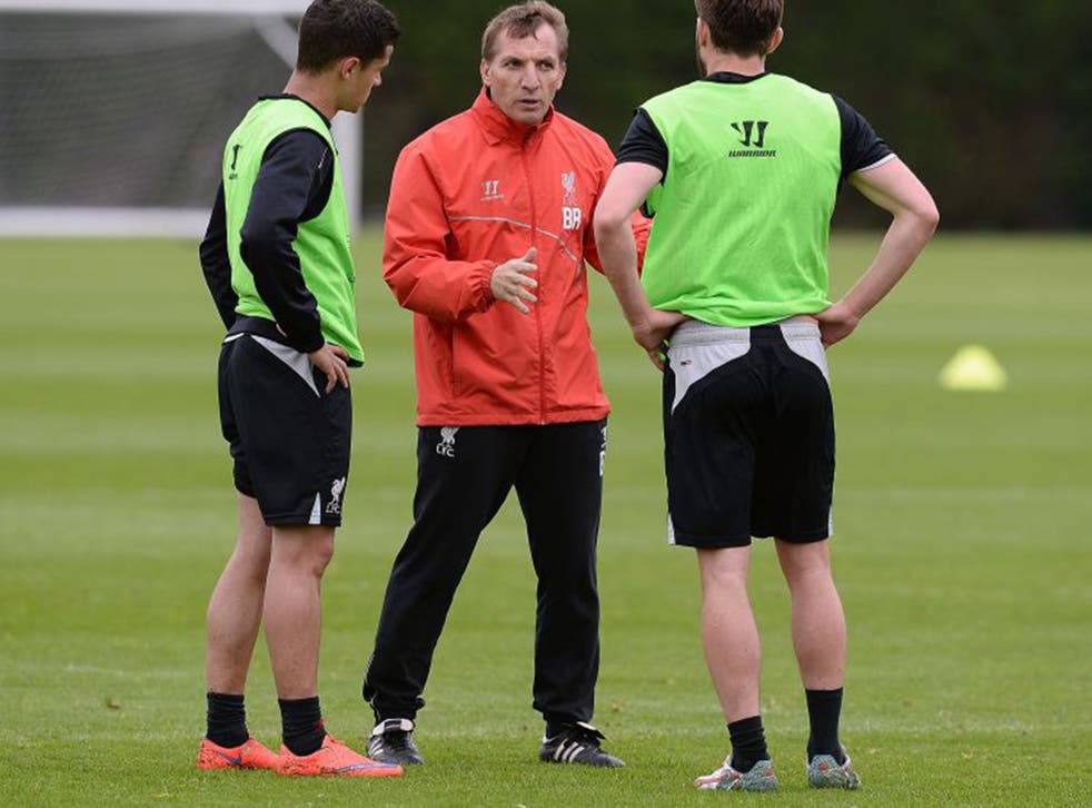 Brendan Rodgers (centre) will feel the pressure when the new season begins