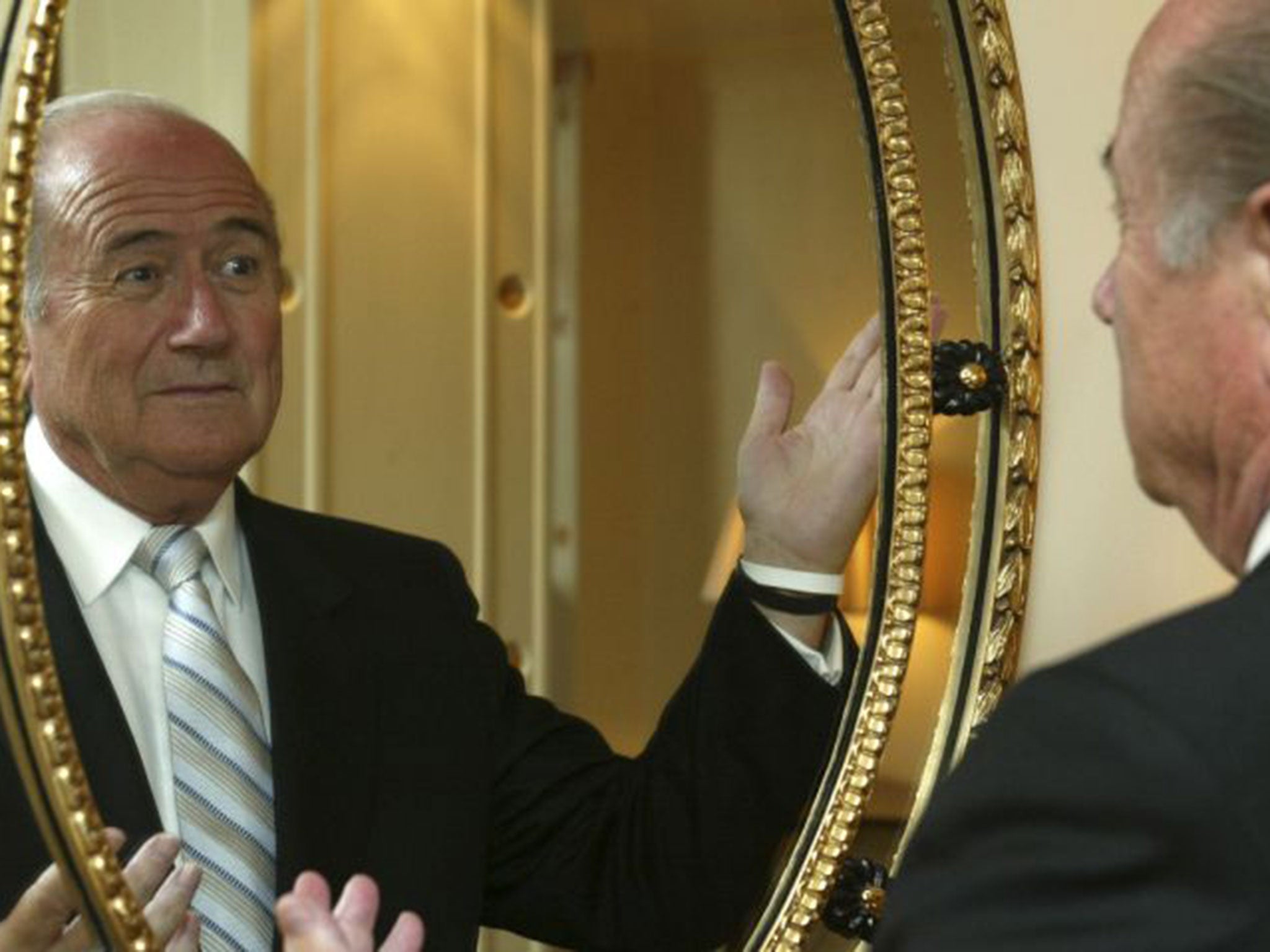 Sepp Blatter poses for a picture in London back in 2005