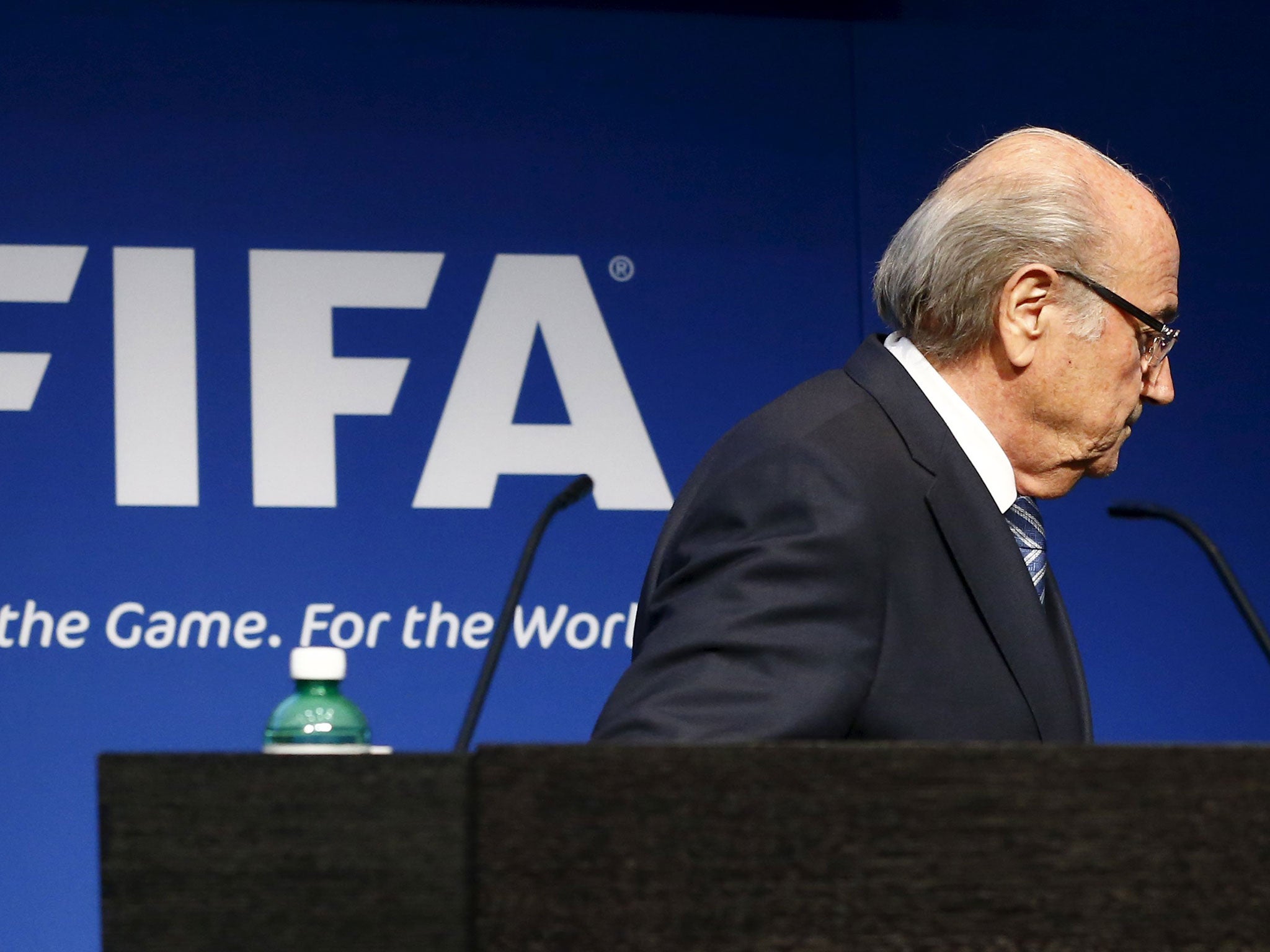 FIFA President Sepp Blatter leaves after his statement during a news conference at the FIFA headquarters in Zurich, Switzerland. Blatter resigned as FIFA president, four days after being re-elected to a fifth term. Blatter, 79, announced the decision at a news conference in Zurich, six days after the FBI raided a hotel in Zurich and arrested several FIFA officials