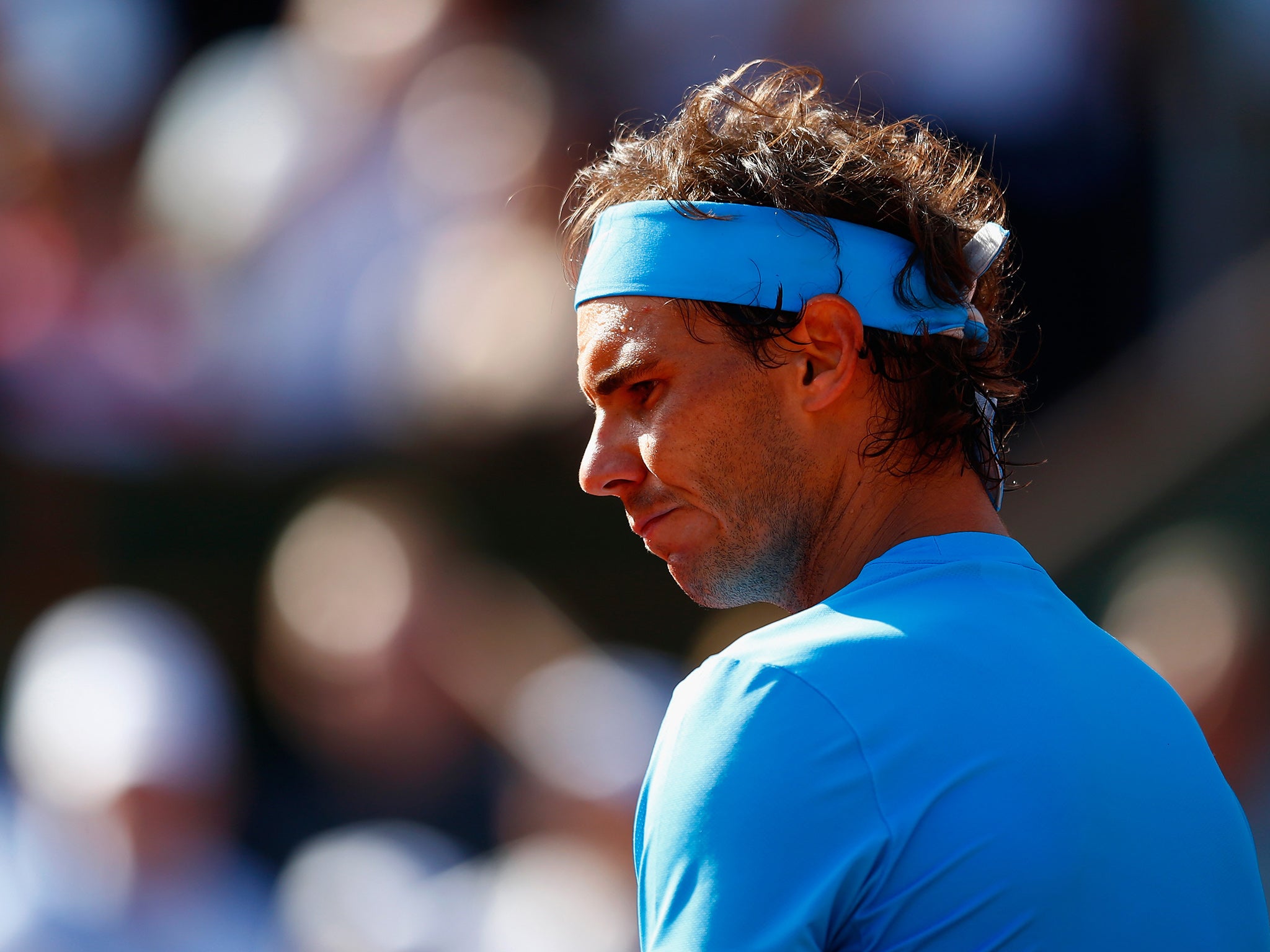 Rafa Nadal reacts after a lost point